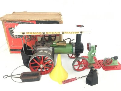 A Boxed Mamod Steam Tractor with Extras.