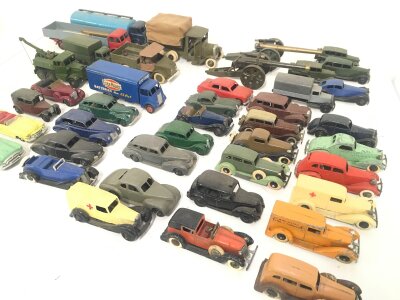A Collection Of Playworn Diecast Mostly Dinky And Britains. Some Re-Paimts.