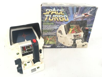 A Boxed Tomy Space Turbo.