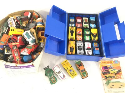 A Matchbox Carry Case Containing Diecast. A Collection Of Playworn Matchbox Diecast Including Power Track Cars. Matchbox Catalogs. A Staff Hand Bbok And Matchbox Carrier Bags. No Reserve.