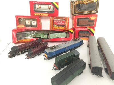 A Collection Of 00 Gauge Locos. Wagons And Coaches. Including The Flying Scotsman.