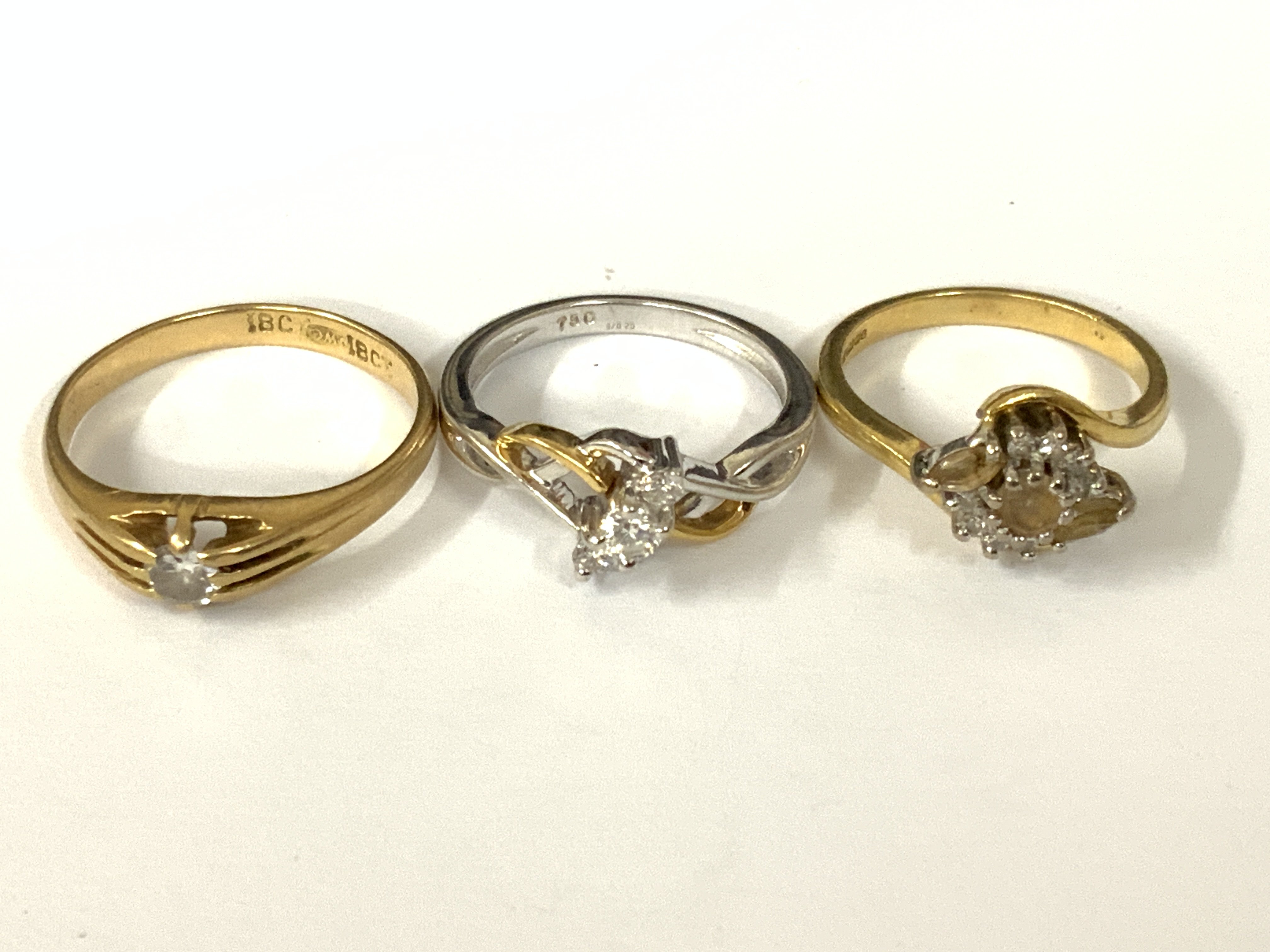 Three 18ct gold assorted diamond rings. Approx ring size J,L,N. Approx 11.5g. Postage category A