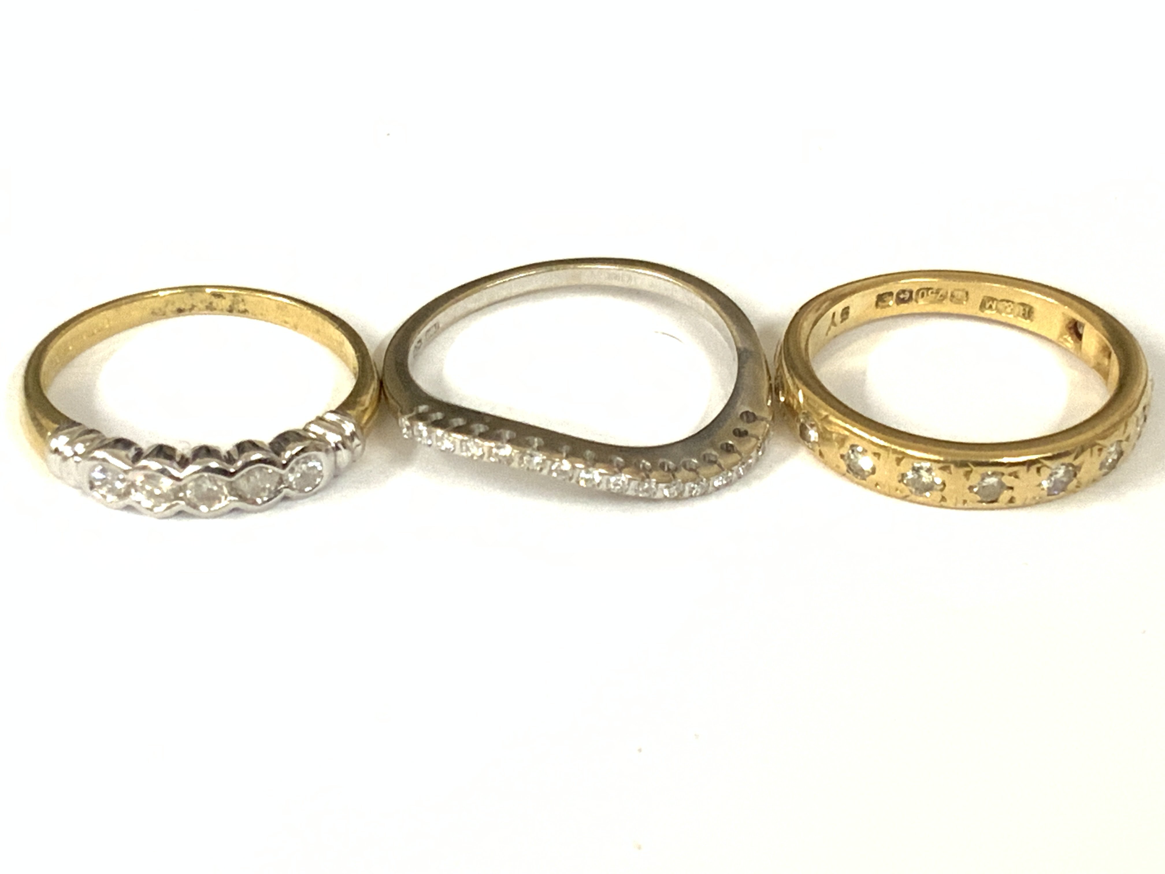 Three 18ct gold diamond half hoop rings. Approx ring size K,N. Approx 7.9g. Postage category A
