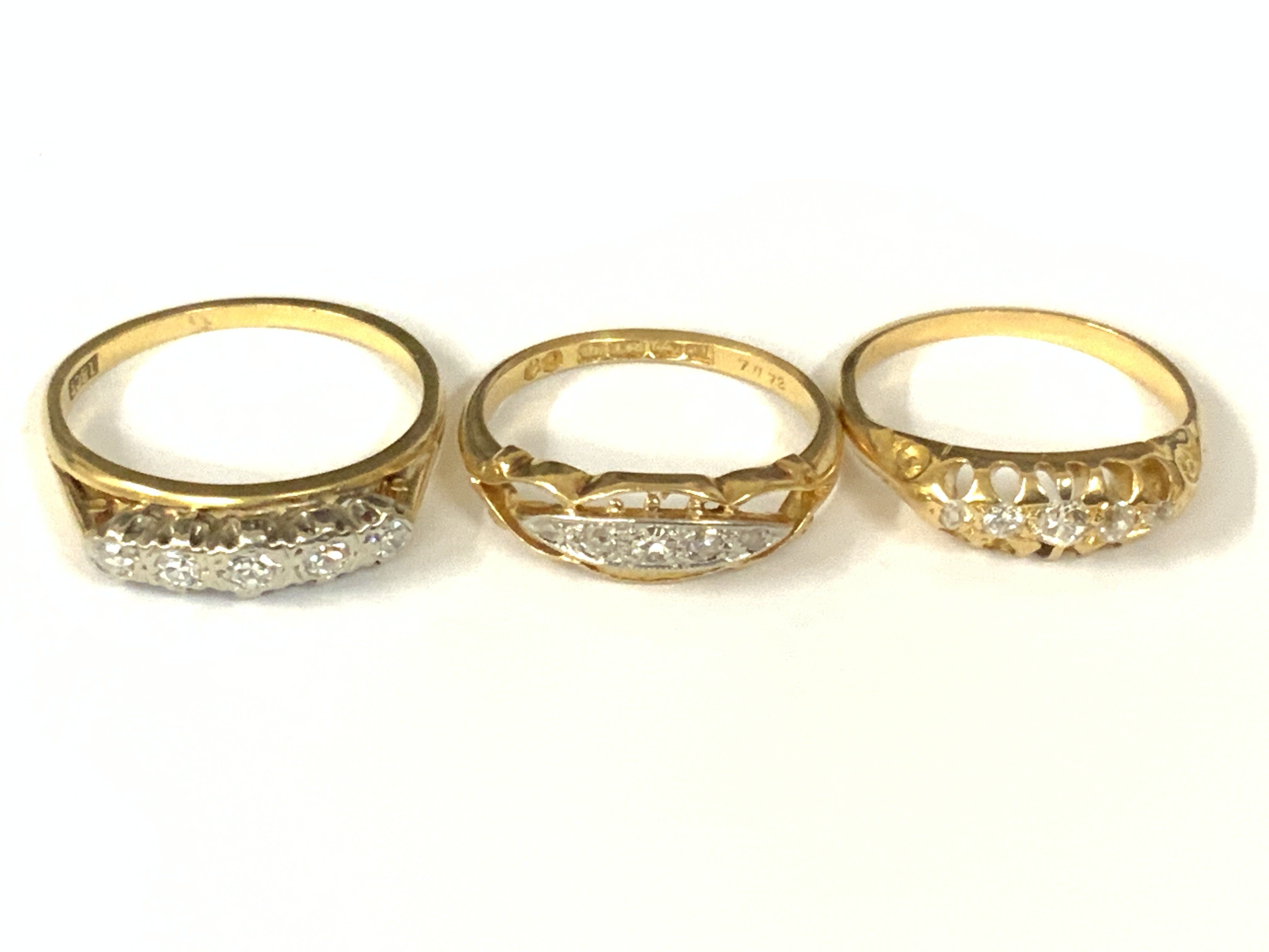 Three 18ct gold five stone diamond rings. Approx ring size L,M,P. Approx 9.3g. Postage category A