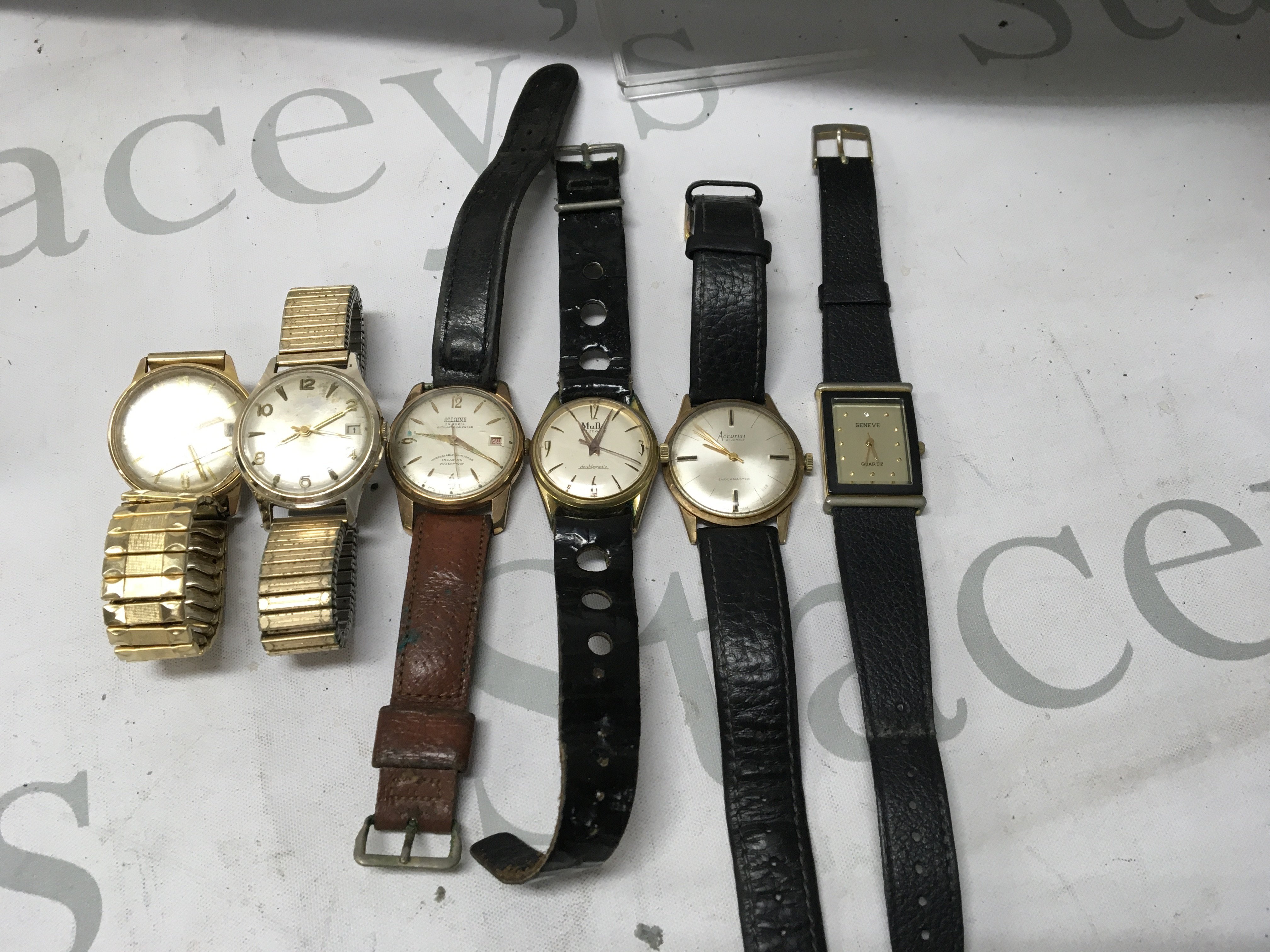 A collection of six vintage dress watches.
