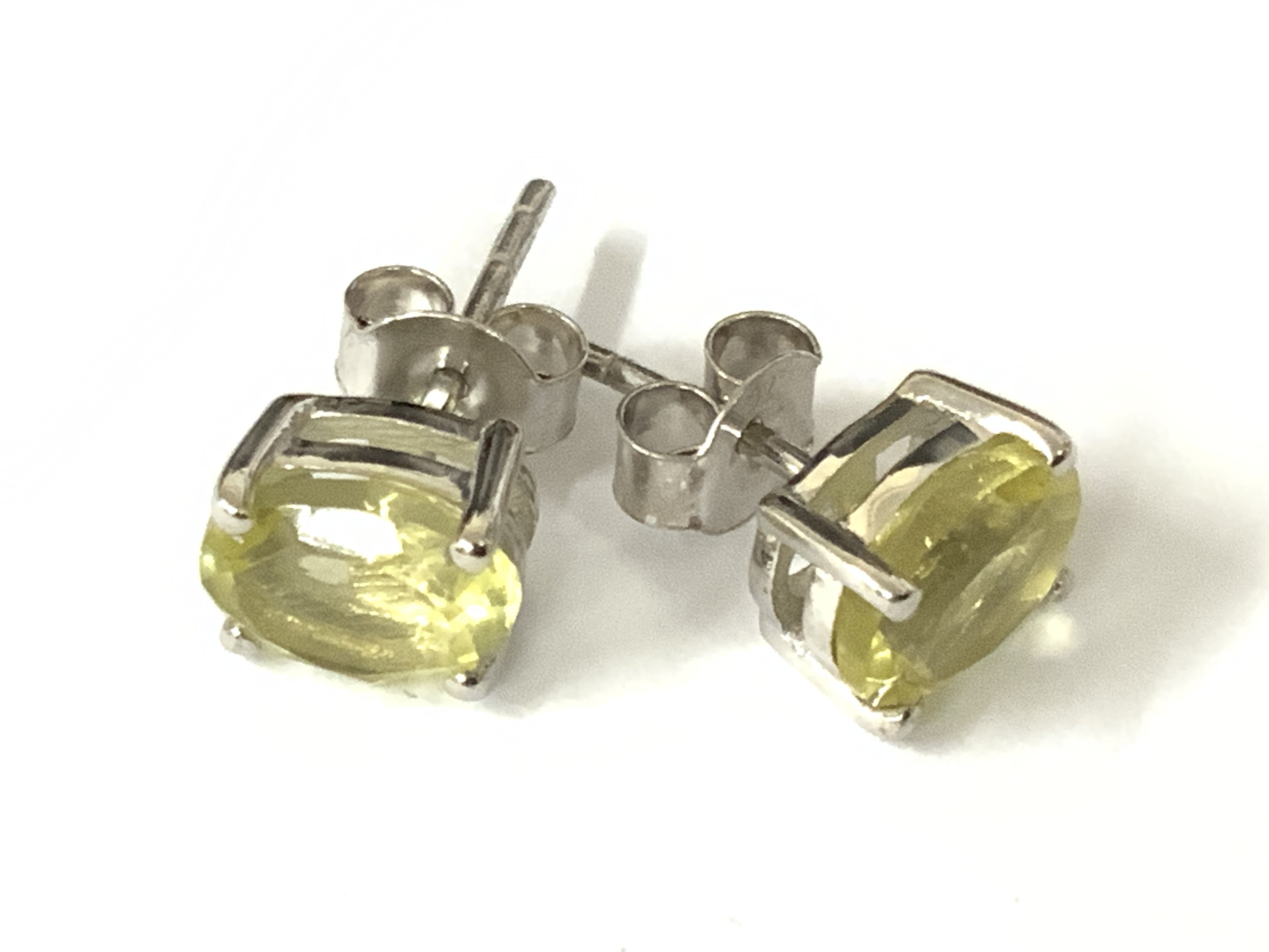 Pair of lemon quarts studs in silver. Postage category A