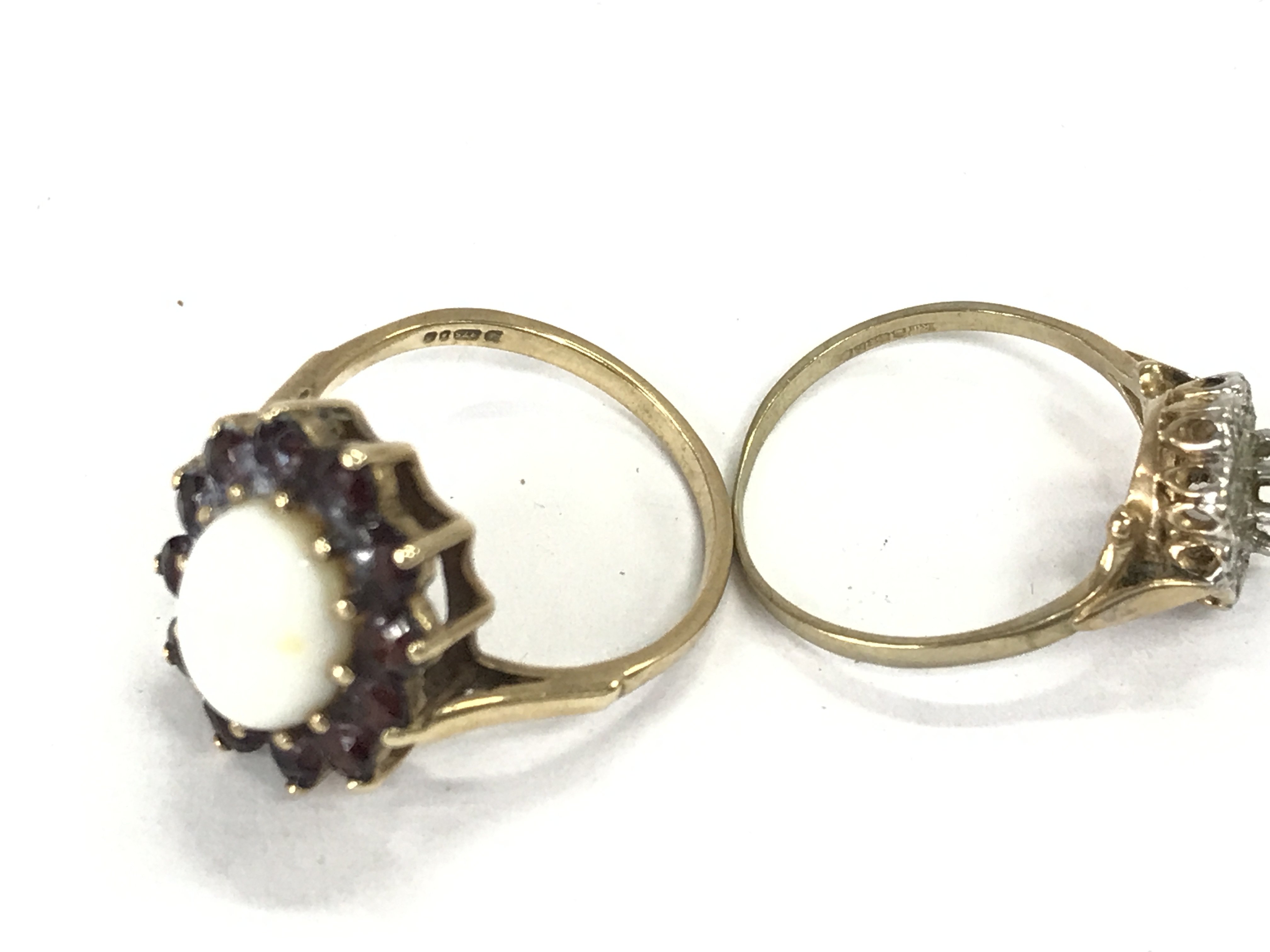 Two 9ct gold rings both set with Opal. 5.15g size O and N 1/2