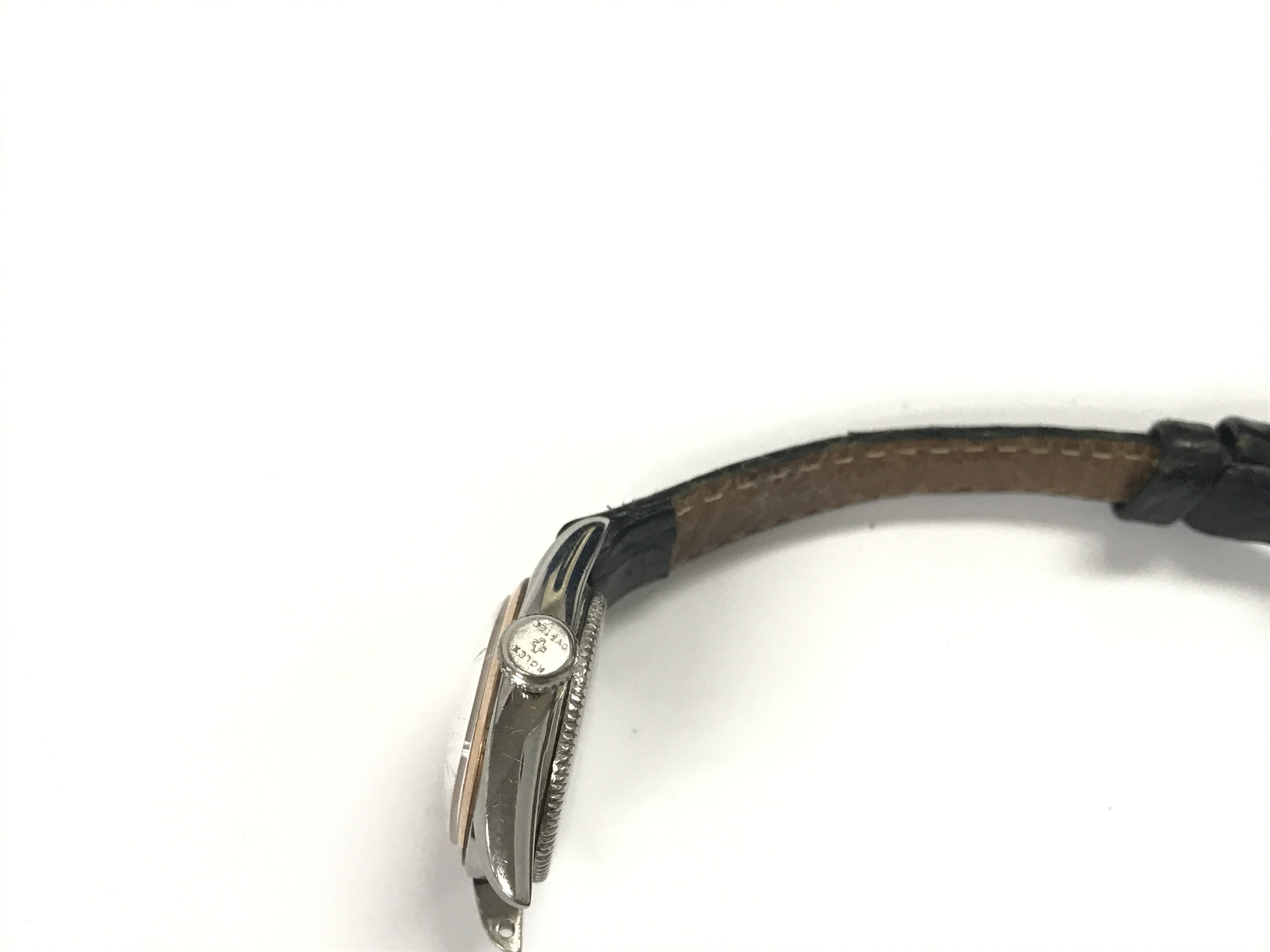 A vintage Rolex ladies Oyster Precision watch. Approximately 24mm case. Black leather strap. Comes with aftermarket box. Not seen running.