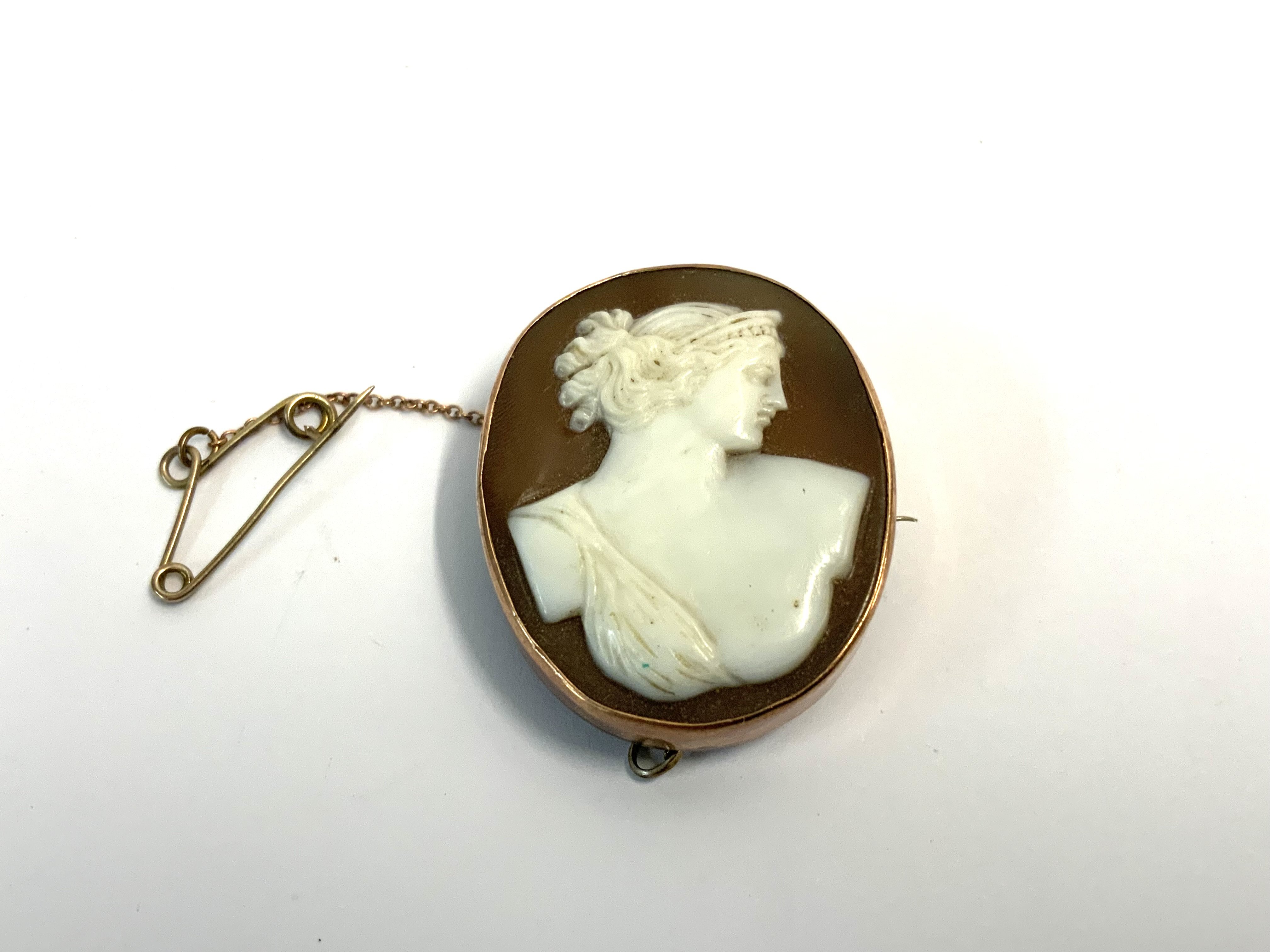 A gold mounted late Victorian classical cameo brooch.