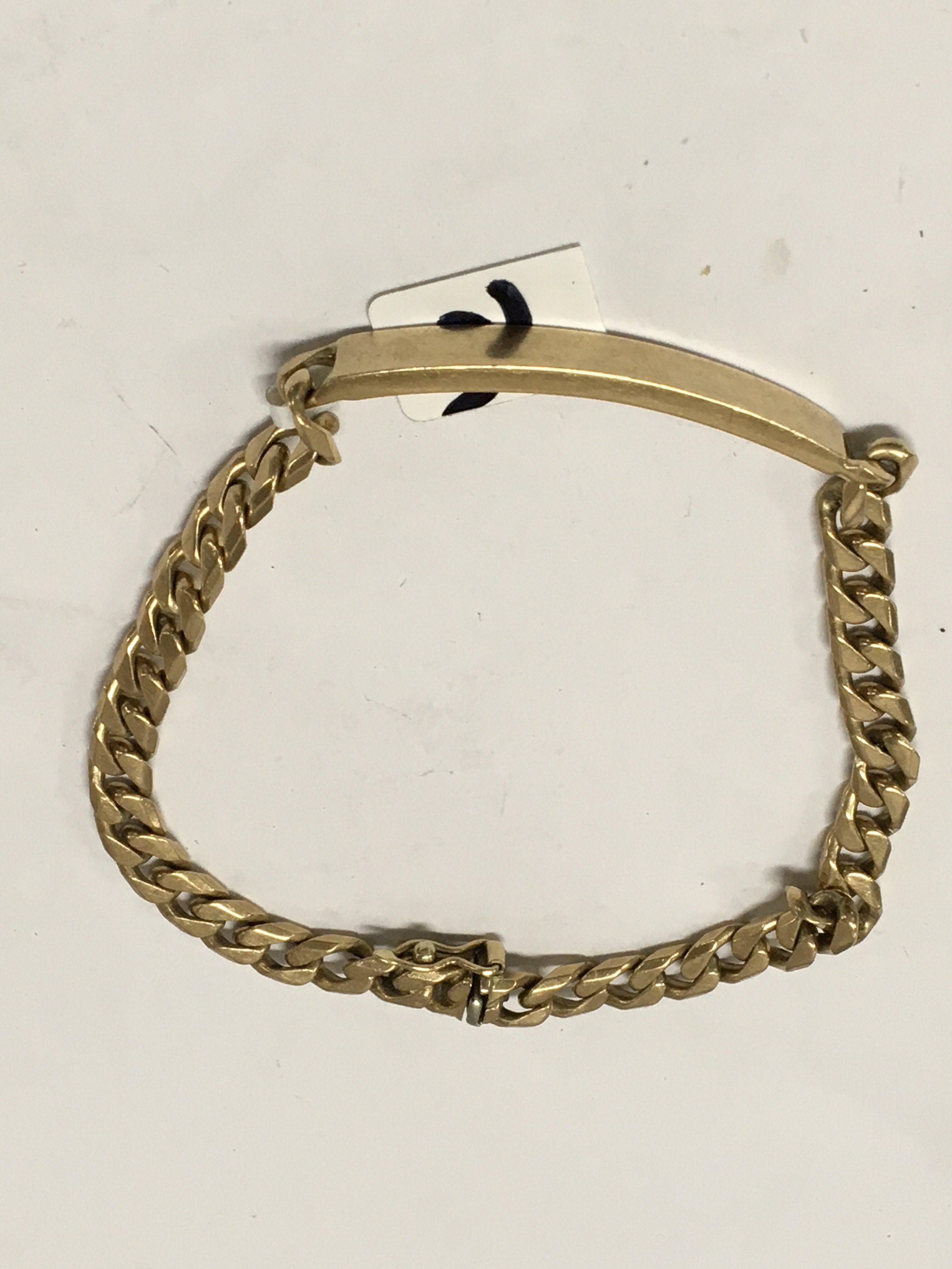 A 9 ct gold ID bracelet 16.9 grams