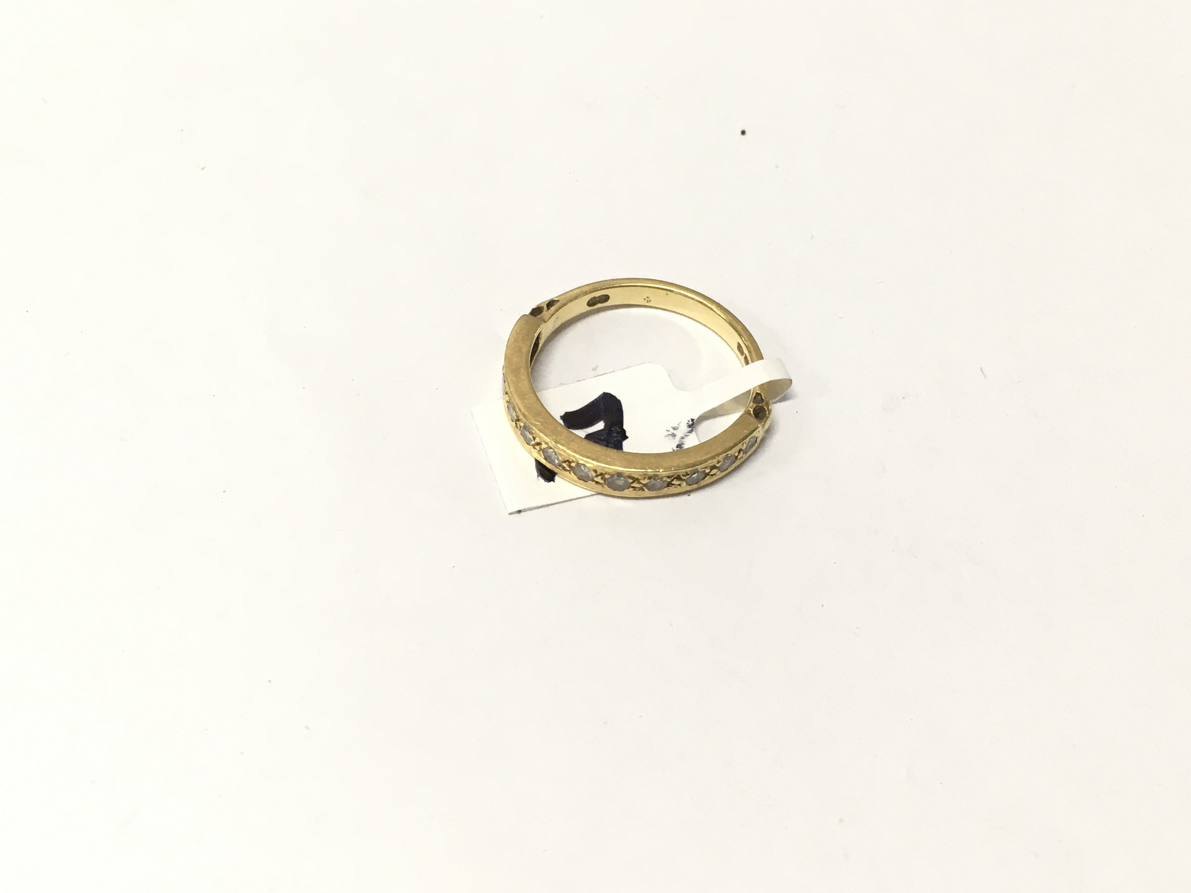 An 18ct gold diamond ring, Approx weight 3.22 grams, size O.