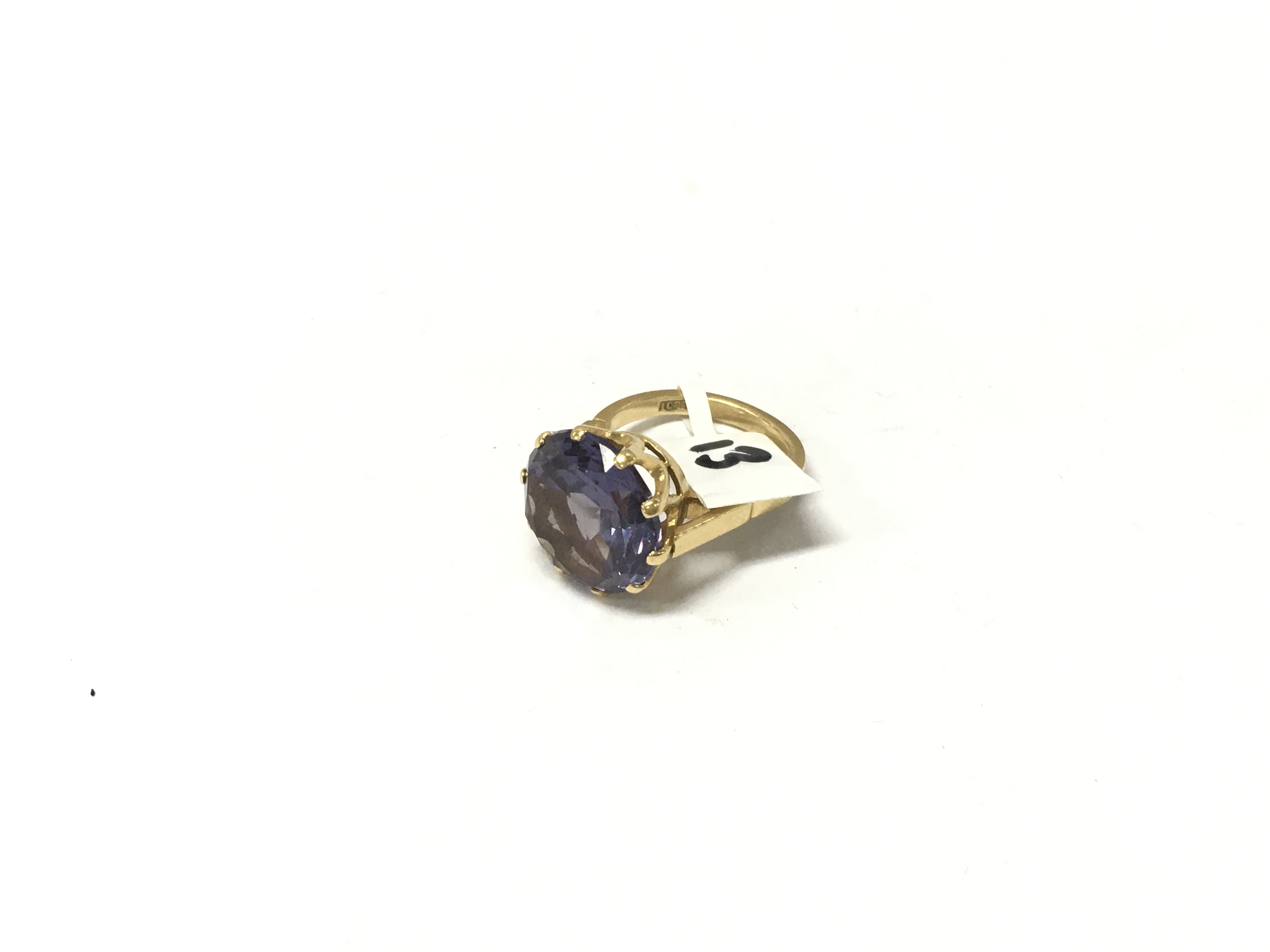 an 18ct gold ring set with a large amethyst. Approx weight 8.6 grams. Size p.