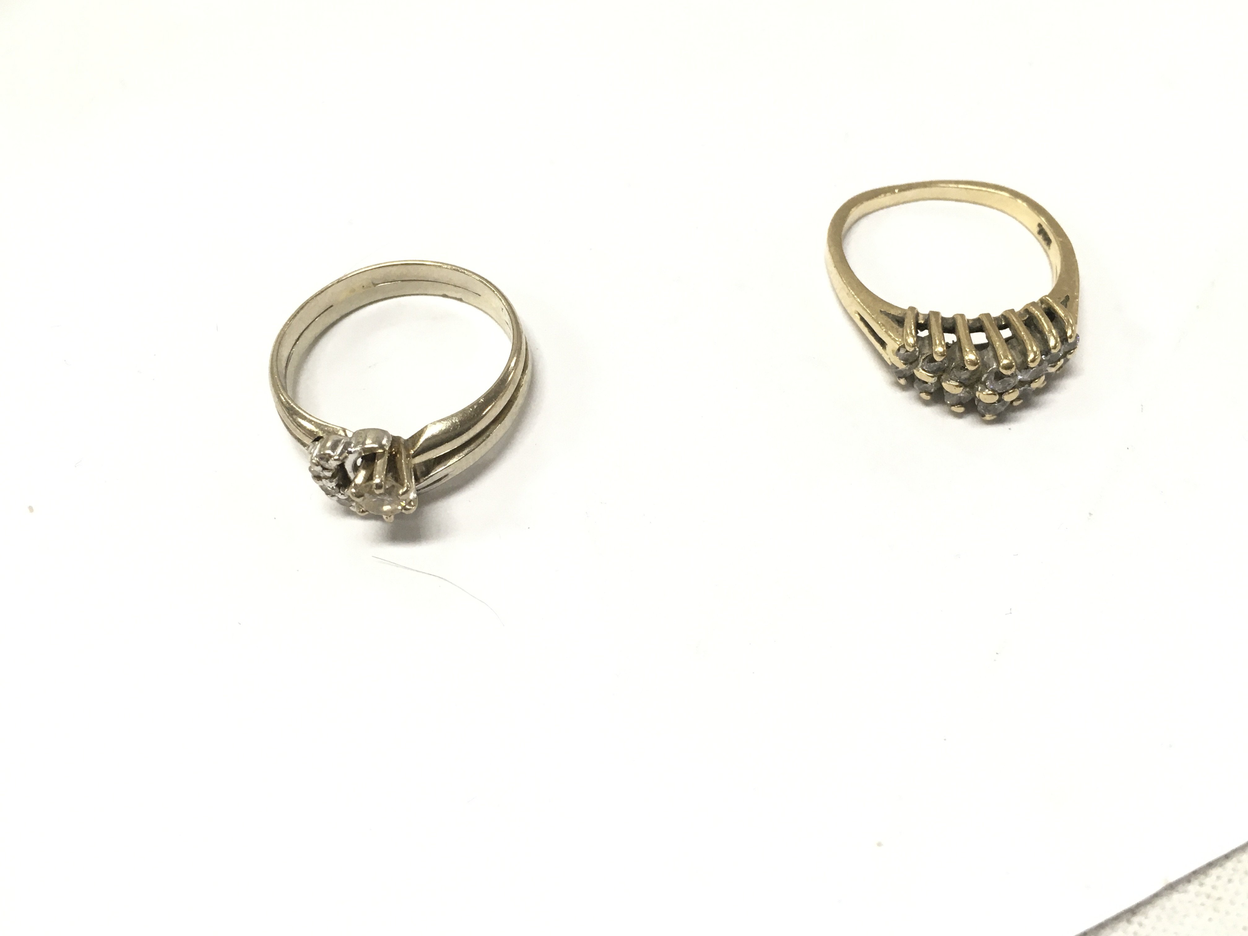 Two 14ct gold diamond cluster rings 1x white gold. Approx weight 6.7 grams, sizes M,N.