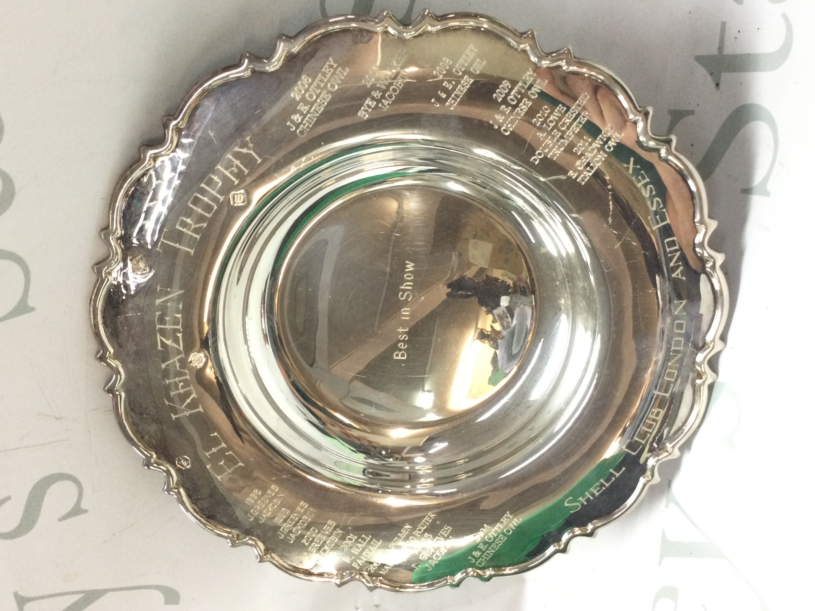 A silver hallmarked Trophy dish , El Khazen Trophy Shell Club London and Essex. 25cm wide. Postage category B
