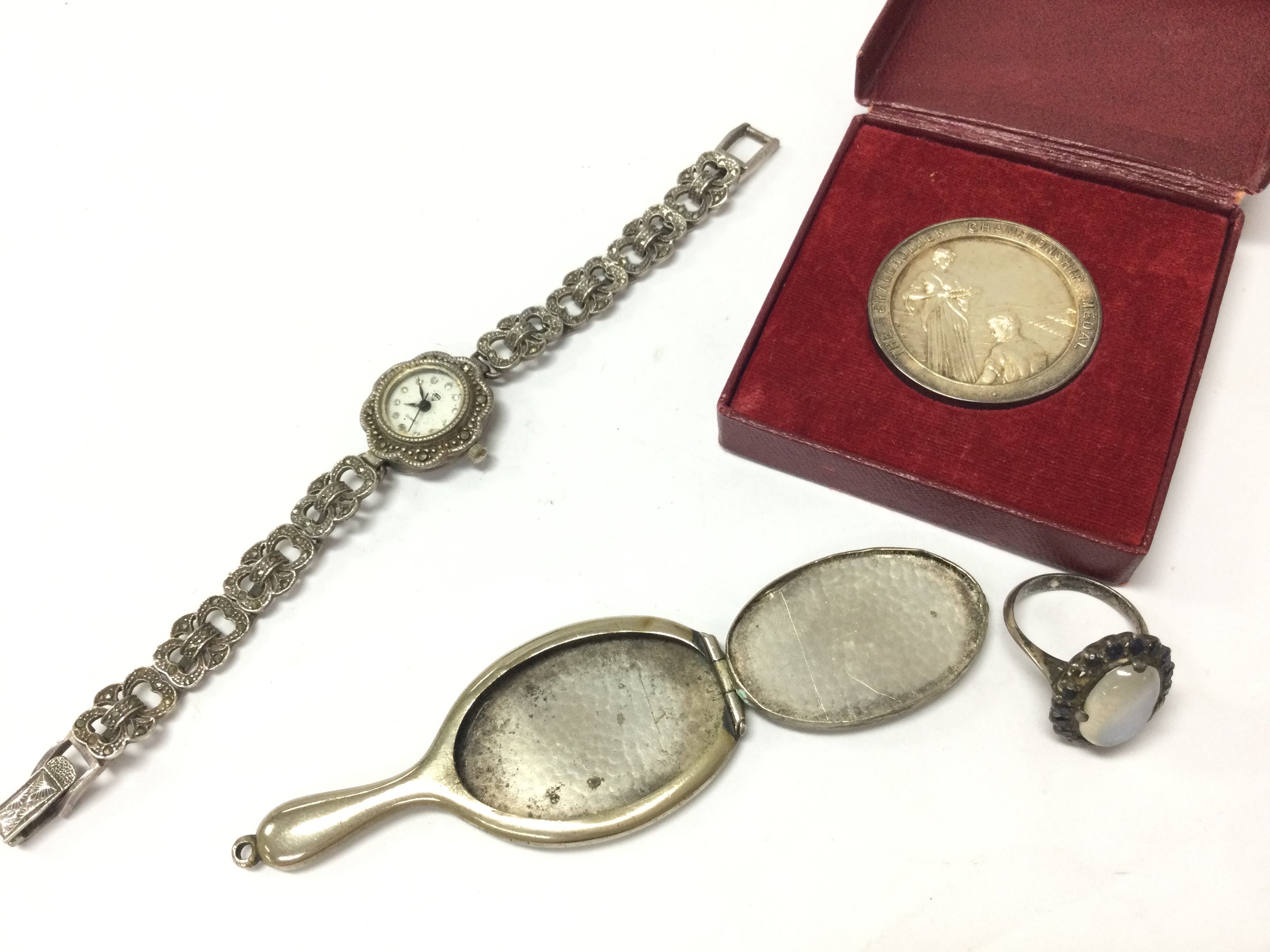 Silver smallholders championship medal, Marcasite watch ,ring and small hand mirror miniature . Postage cat a