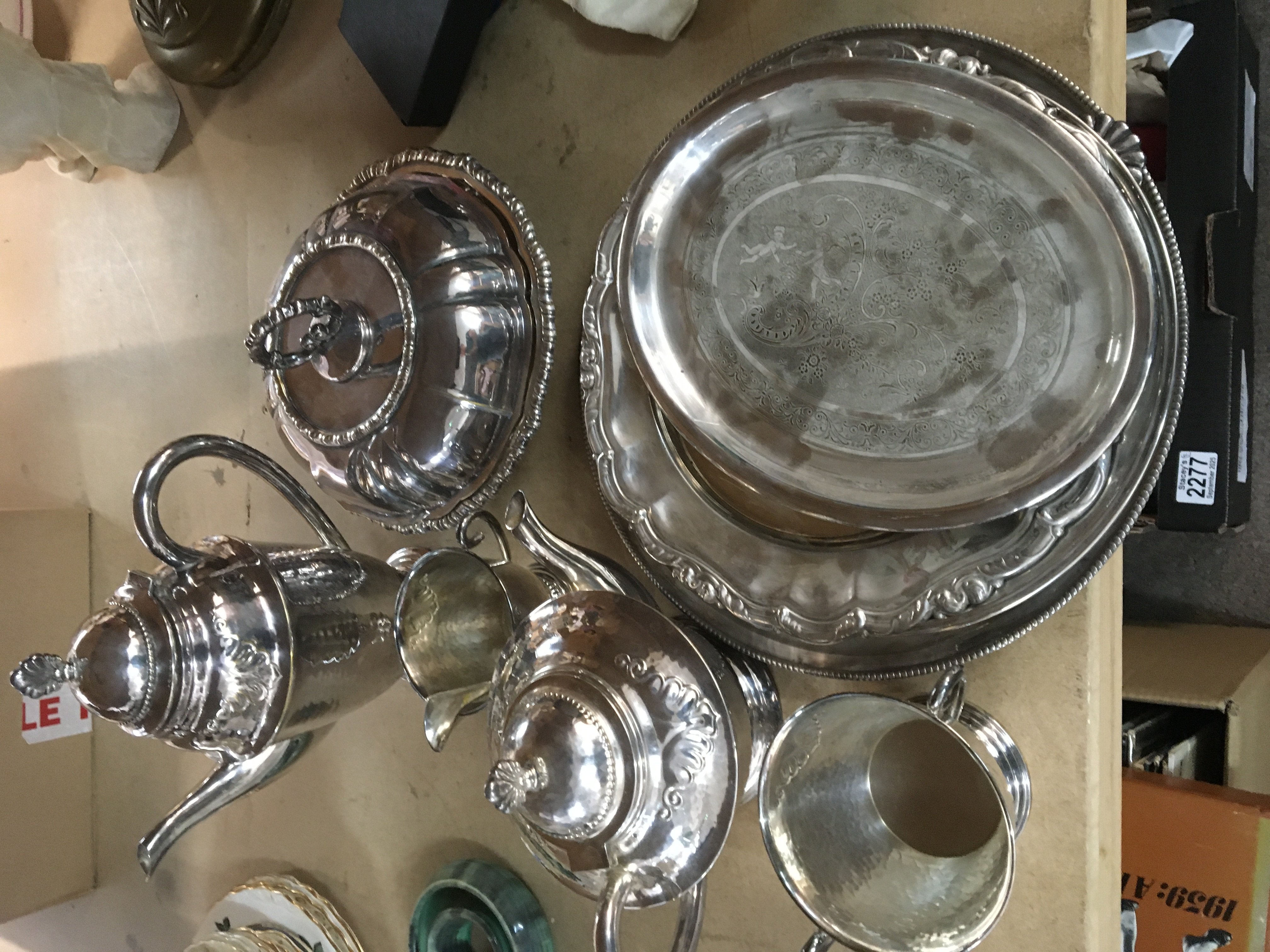 A collection of silver plated ware including Danish tea set and cutlery.