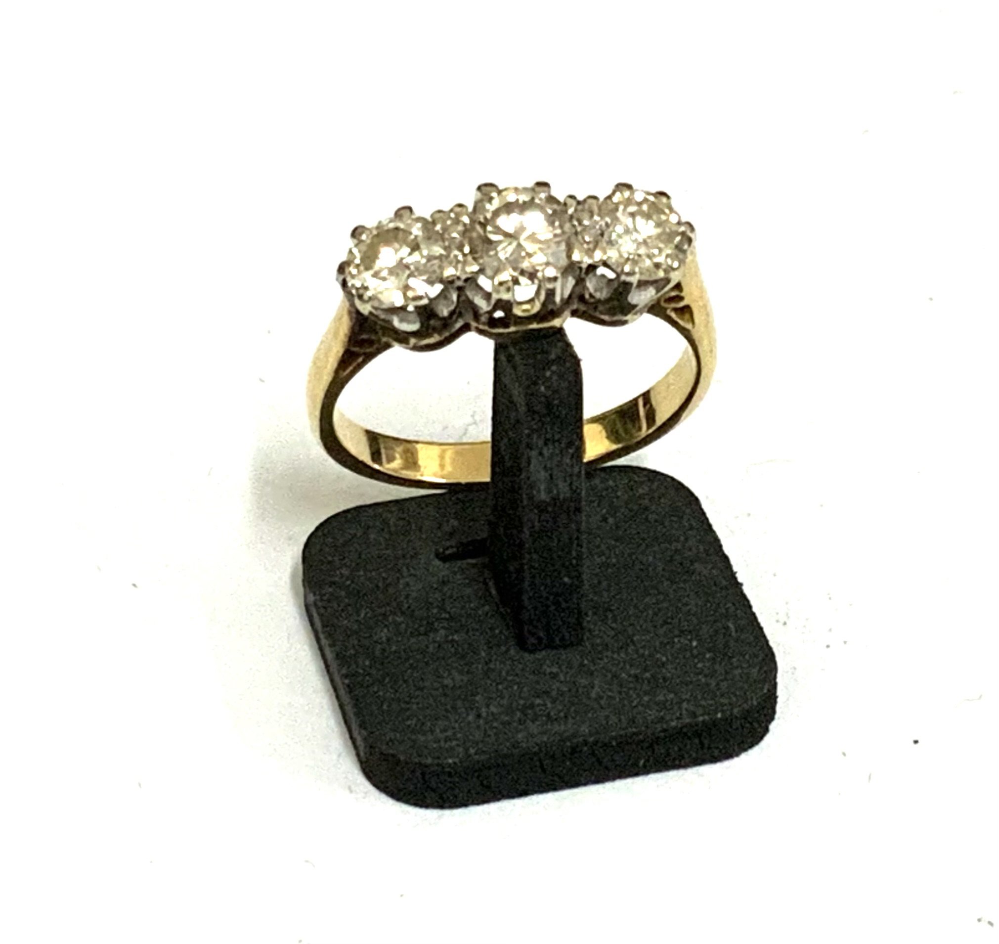 An 18ct yellow gold ring set with 3 Diamonds, approx 1ct total. (A)