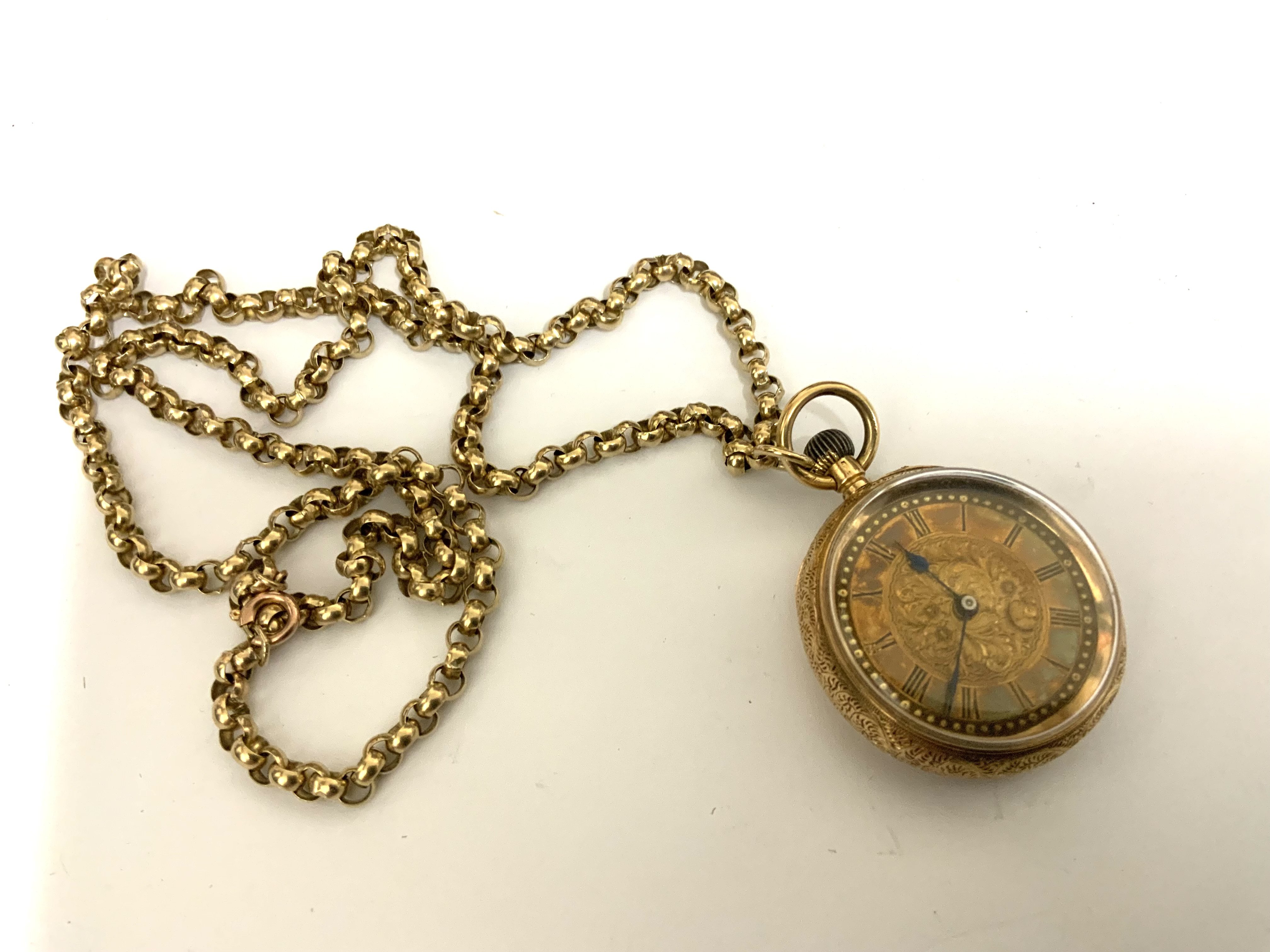 A 9ct gold chain together with an 18ct gold cased ladies pocket watch. (A)