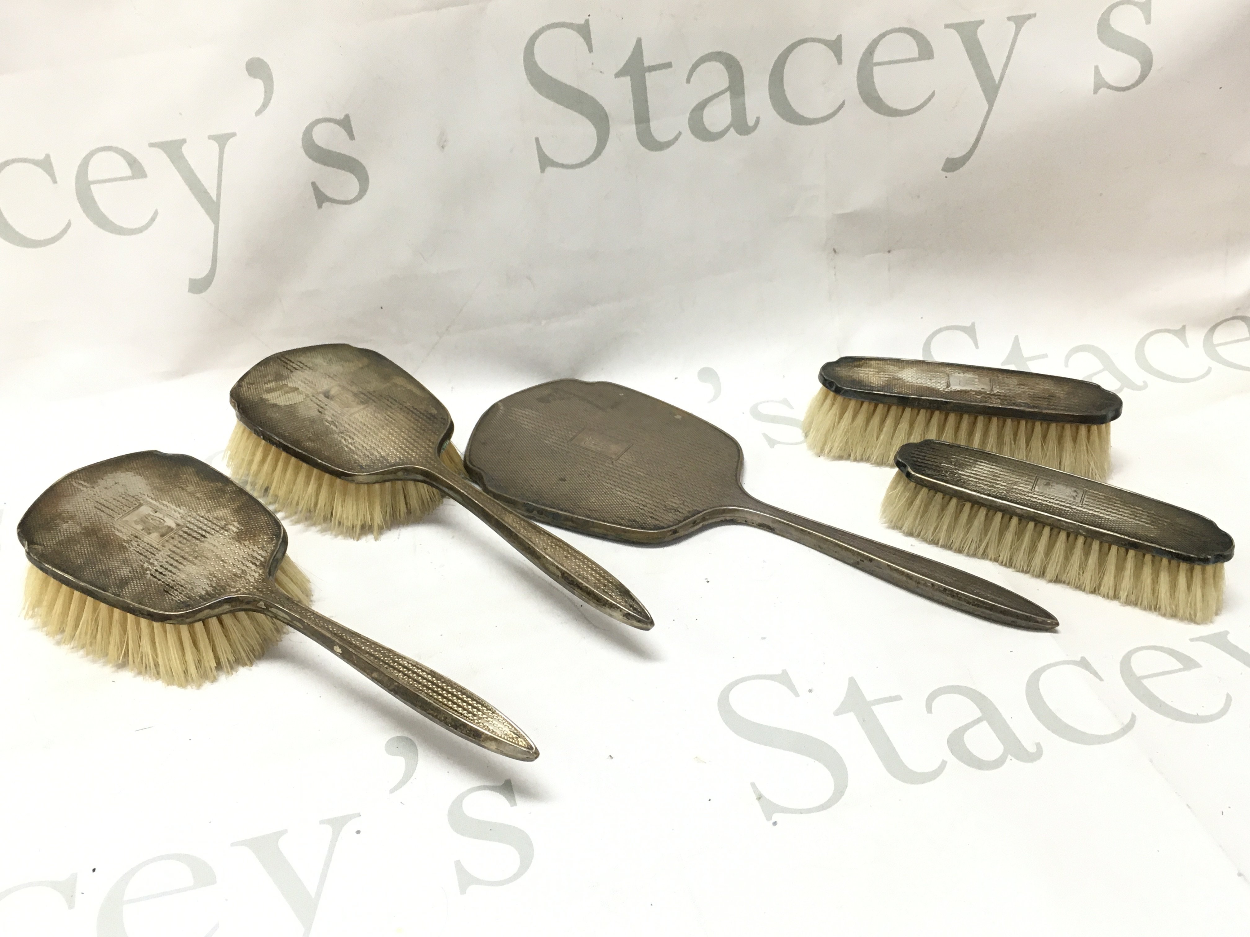 A silver hallmarked brush set , postage category B