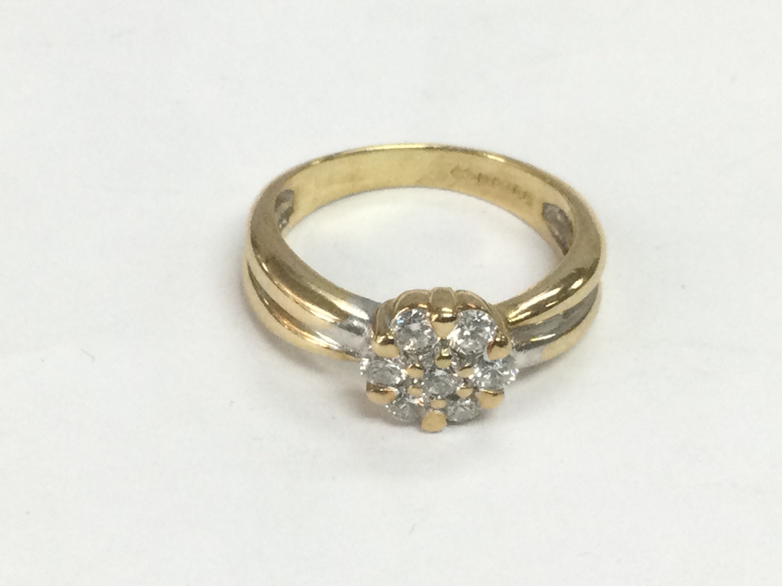An 18ct gold diamond cluster ring, approx 1ct, approx 4.7g and approx size K. Shipping category A.