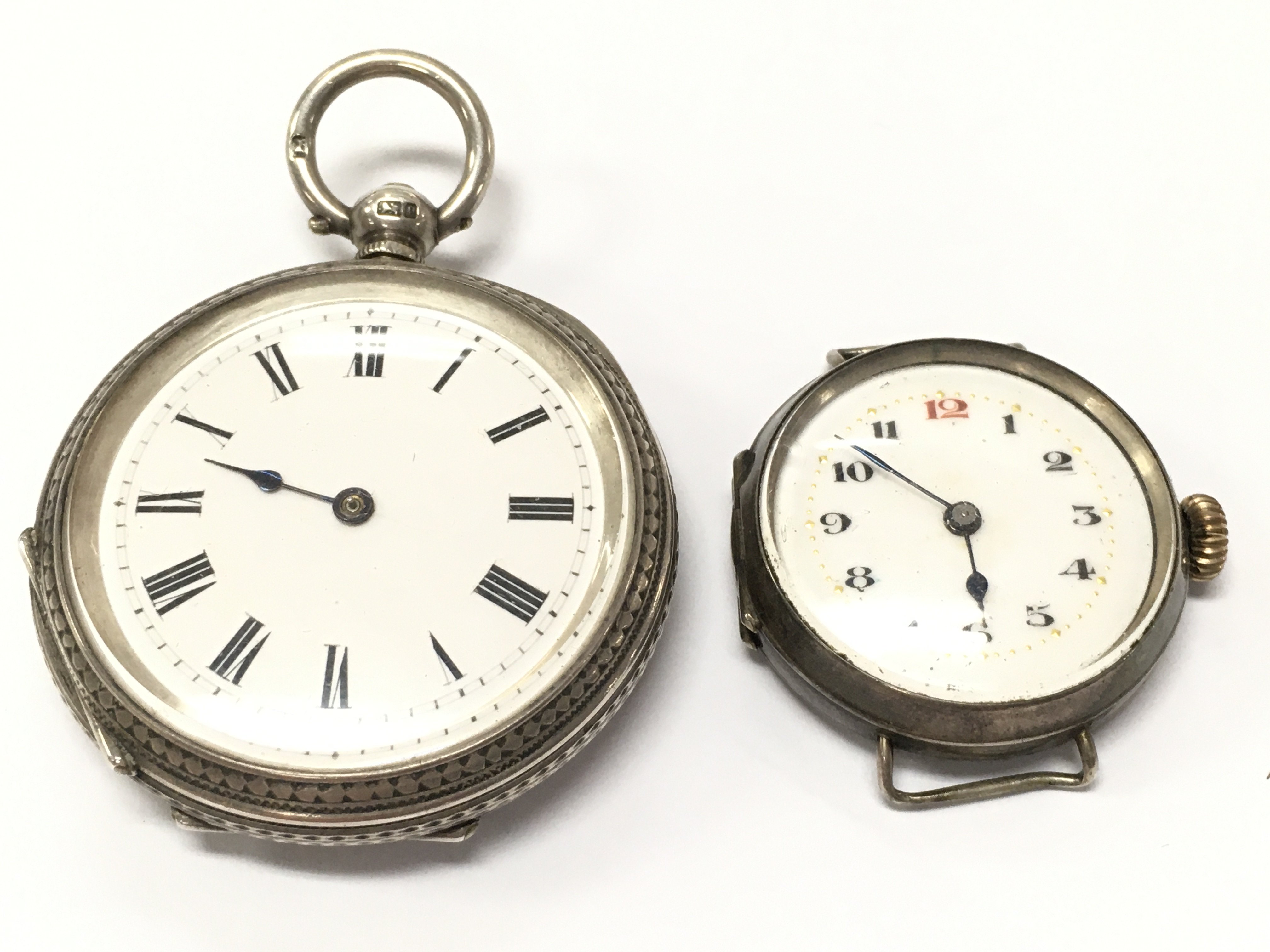 A silver cased pocket watch and wrist watch , postage category A
