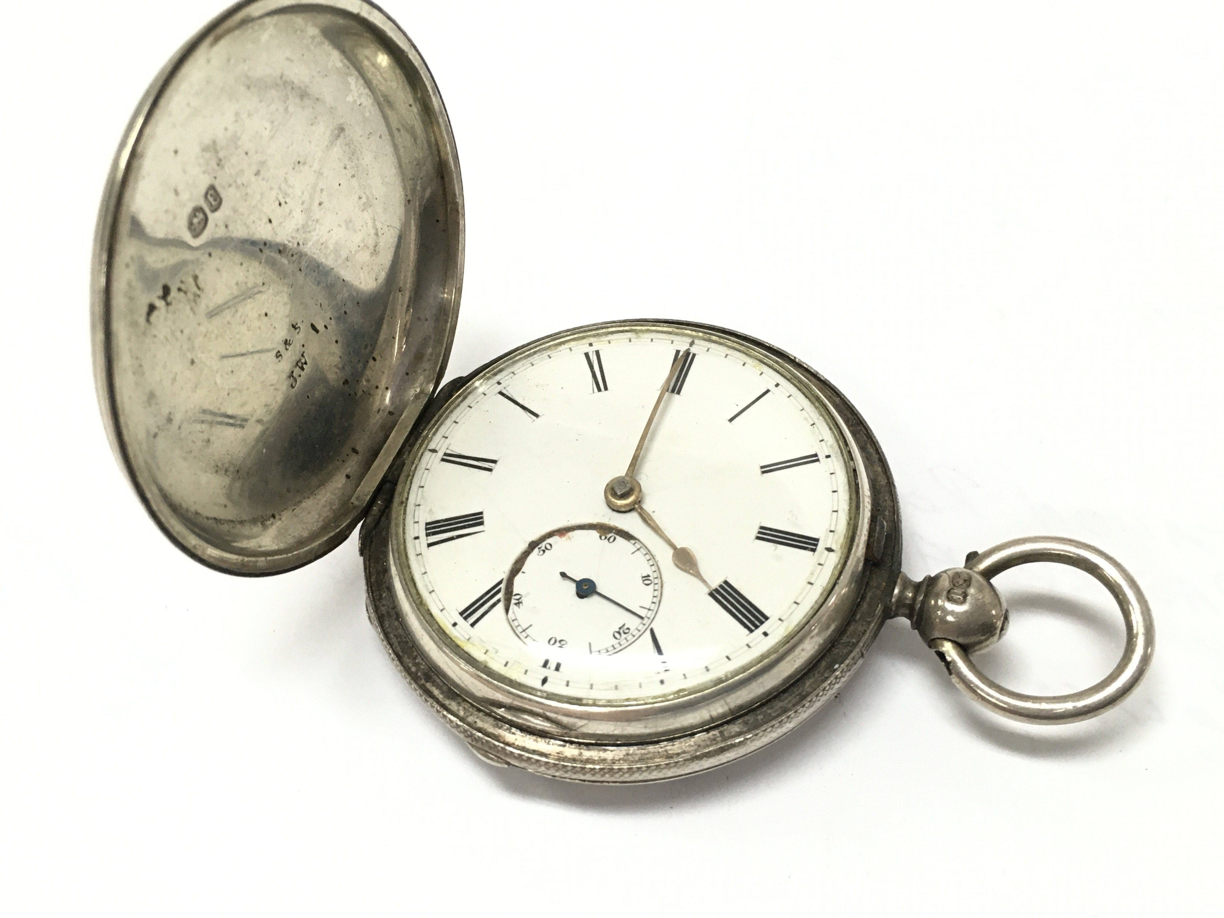 A silver full hunter pocket watch , postage category A