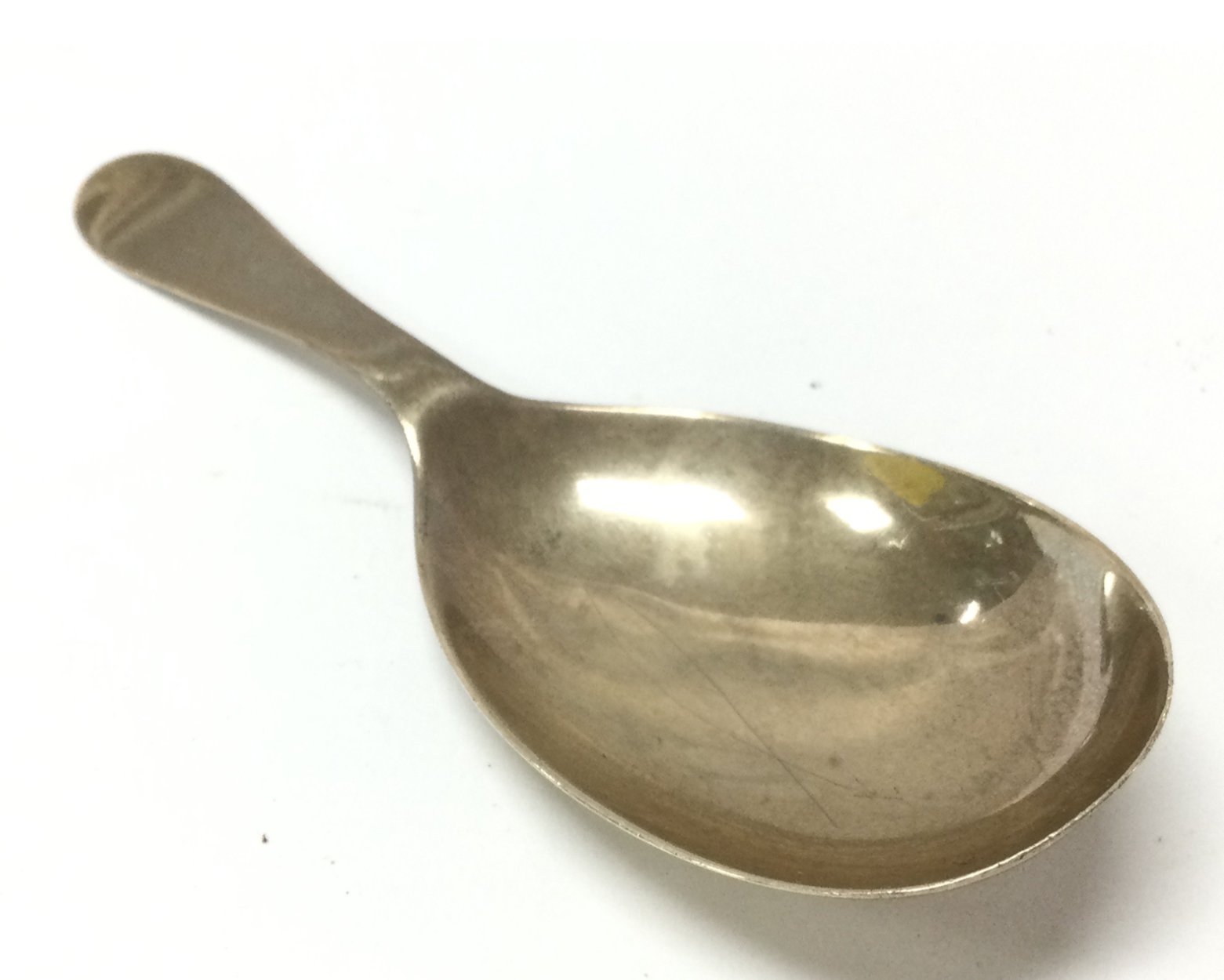 A silver hallmarked caddy spoon, postage category A