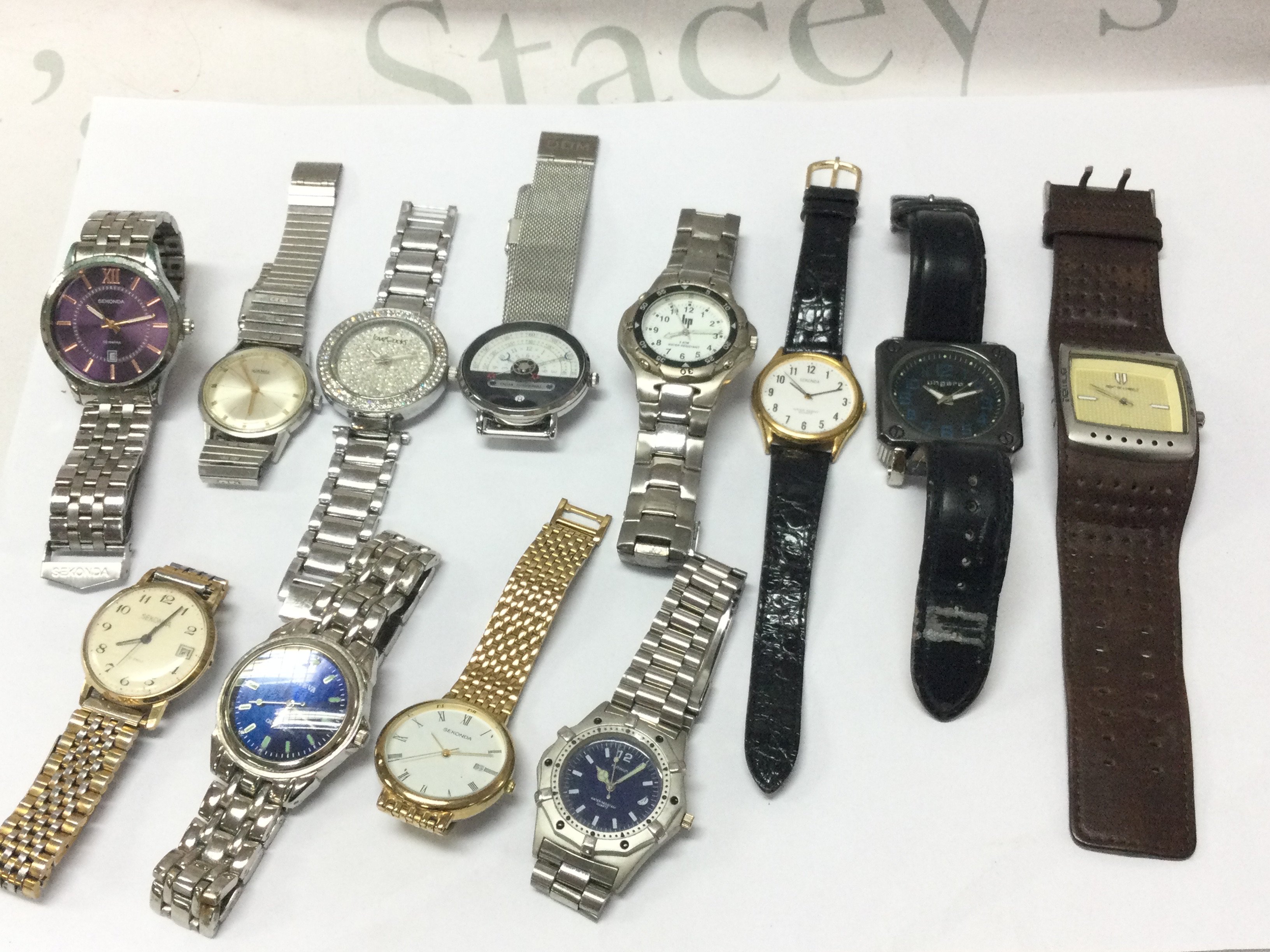 Twelve watches including Sekonda, Roamer, Geneva etc. postage category B