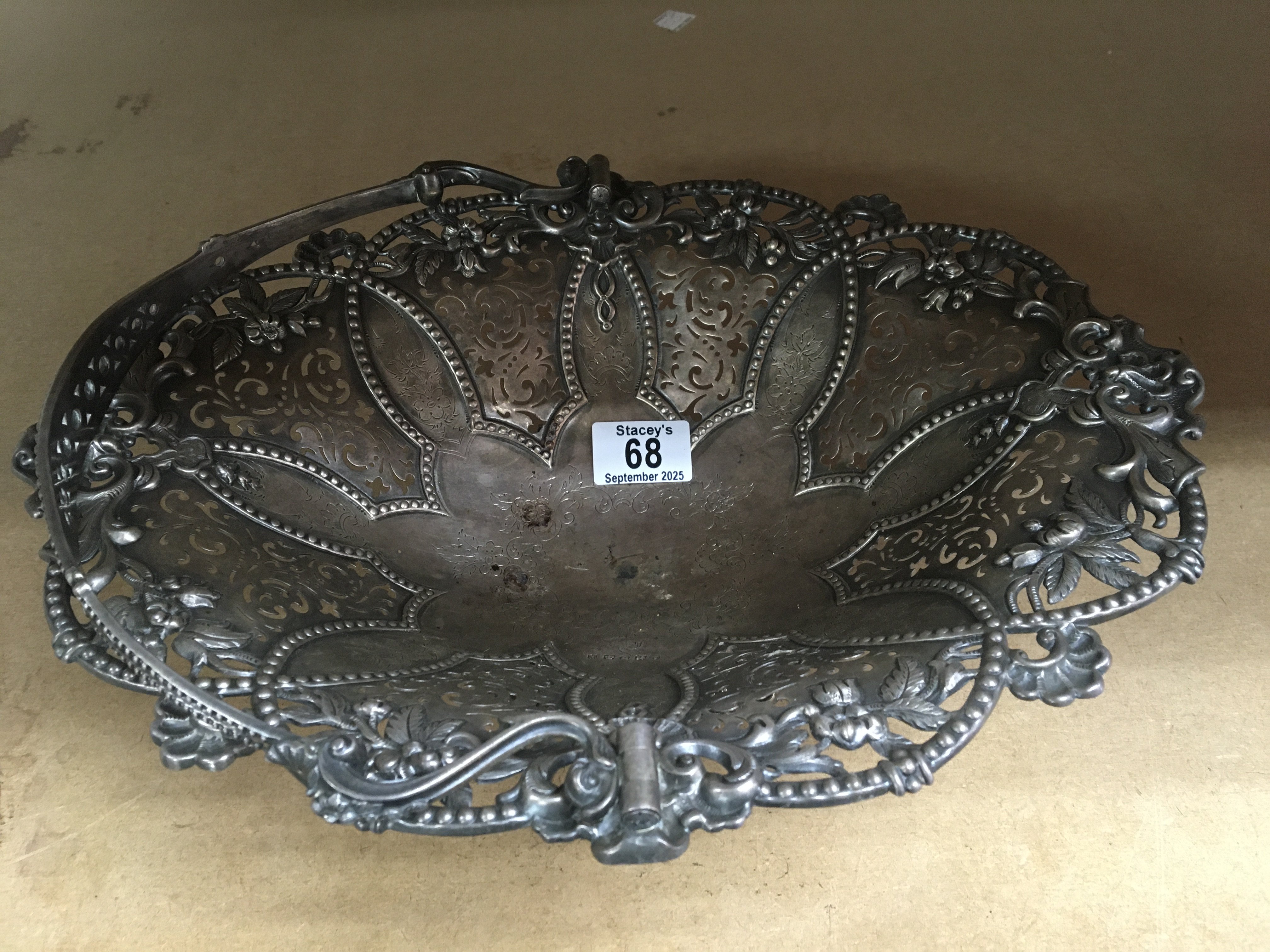 A Victorian silver swing handle basket 970 grams .