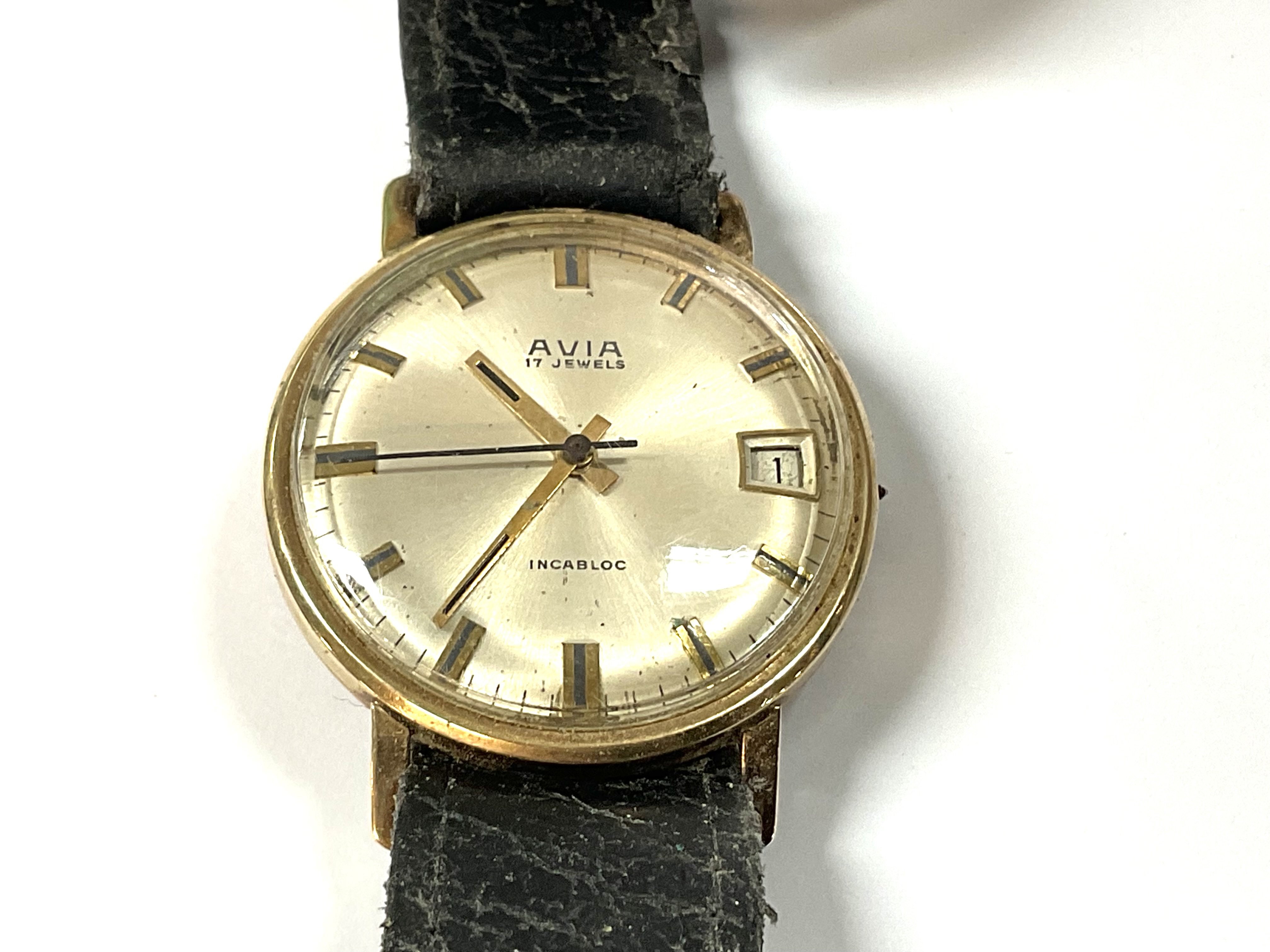 A 9ct yellow gold double hoop wrist watch. (Not in working order).