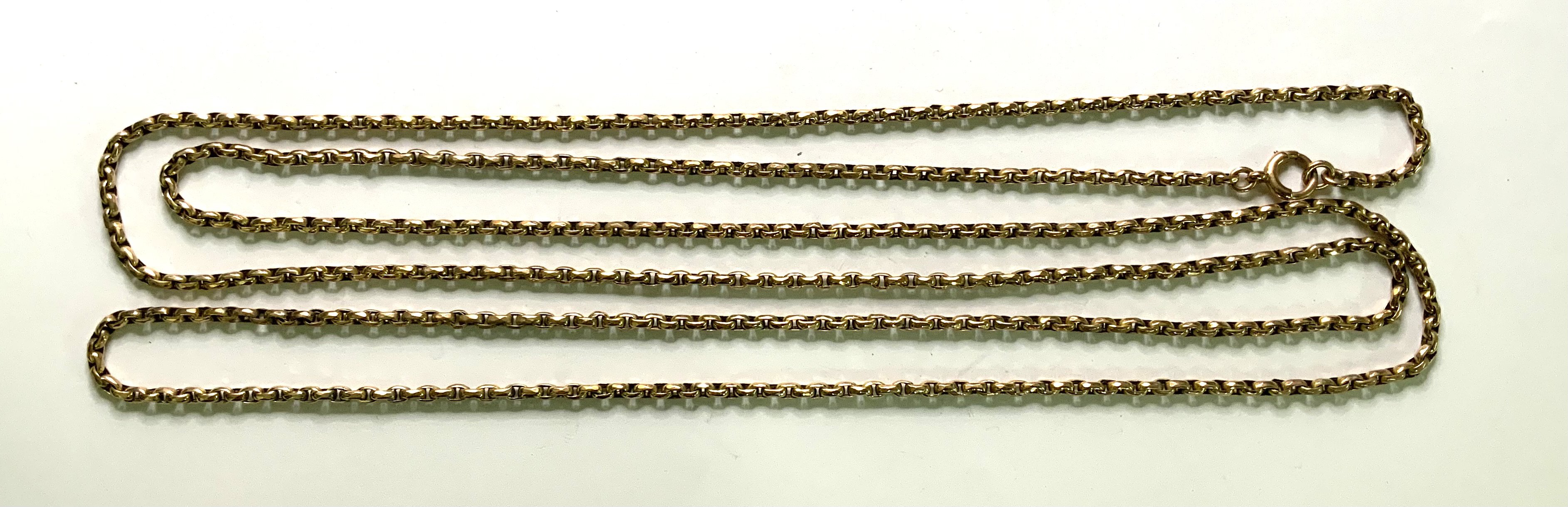 A 9ct gold Muff chain / Guard chain. 75cm. 32.5g (A)