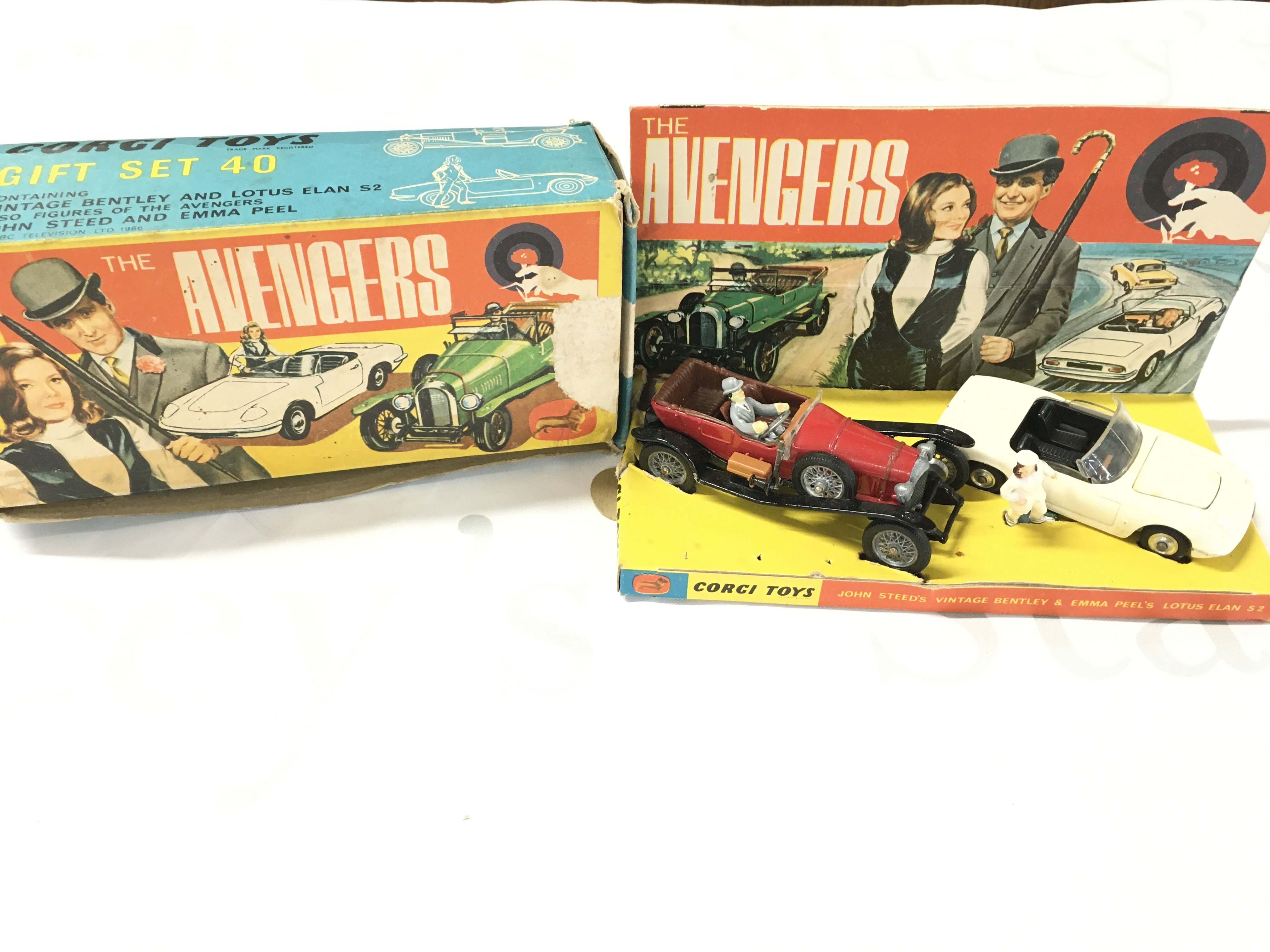 A Boxed Corgi Gift Set #40 The Avengers John Steeds Vintage Bentley & Emma Peels Louis Elan S2. Box Is Worn Umbrellas Missing.
