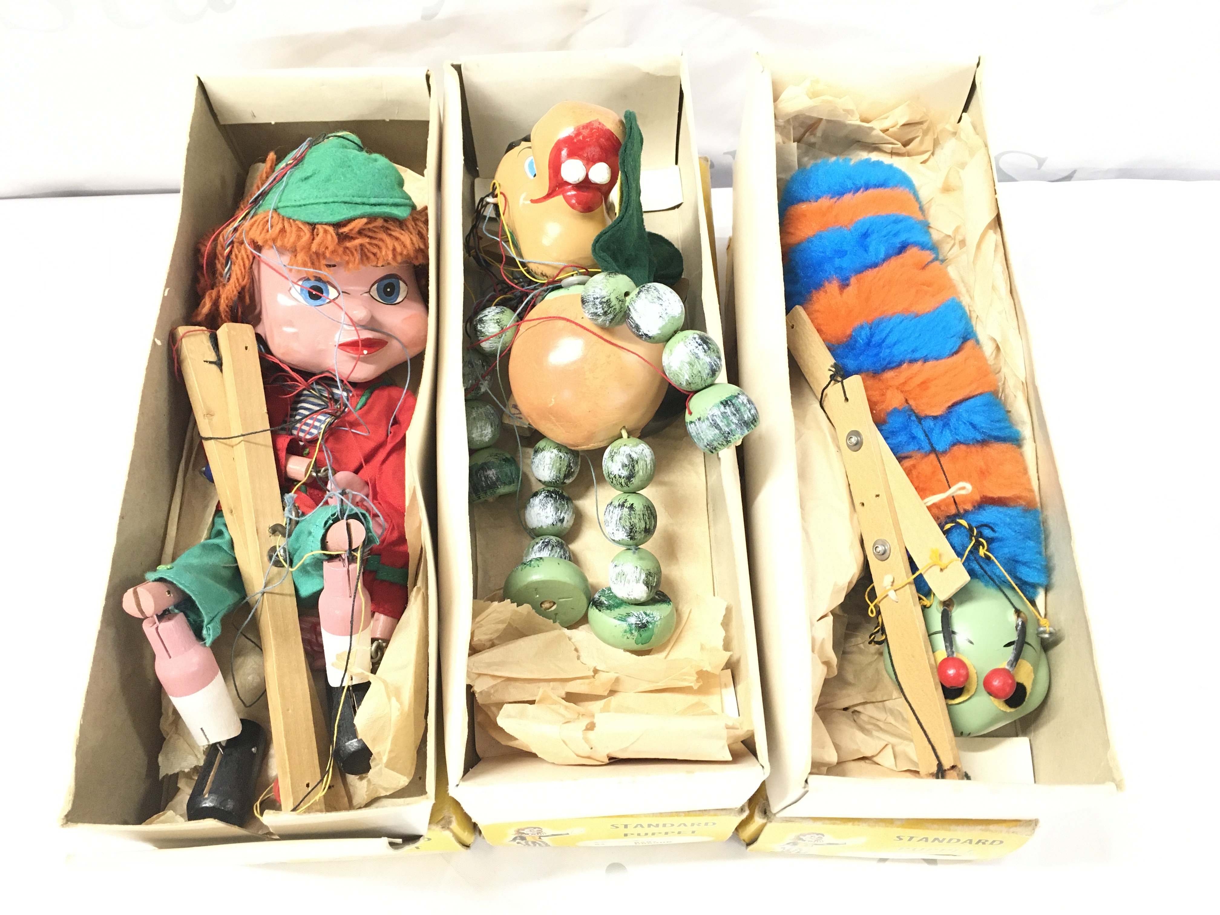 3 X Boxed Pelham Puppets. A Baby Dragon. A Caterpillar And SL Torchy.