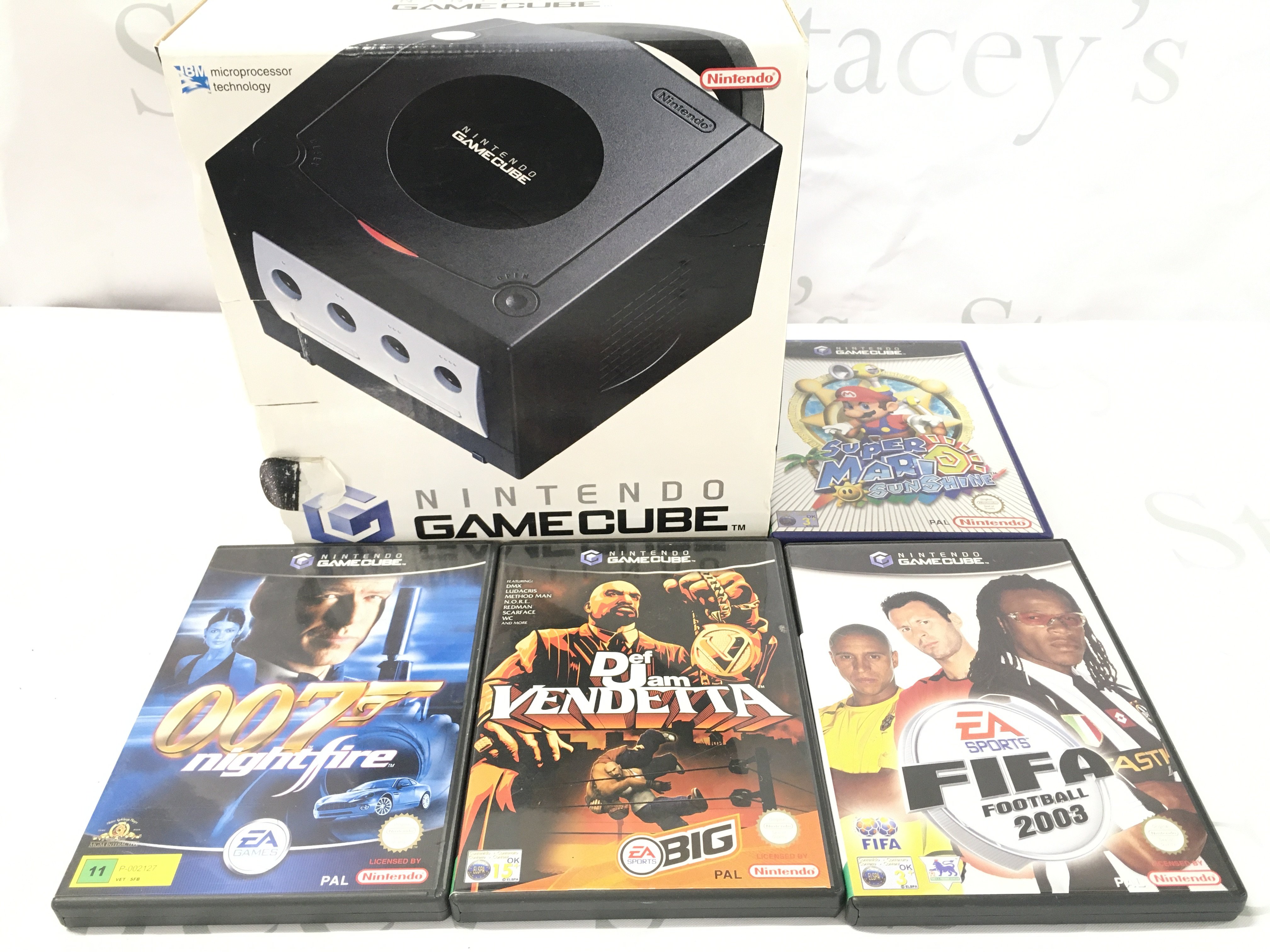 A Boxed Nintendo Gamecube with 4 Games. (2). No reserve.