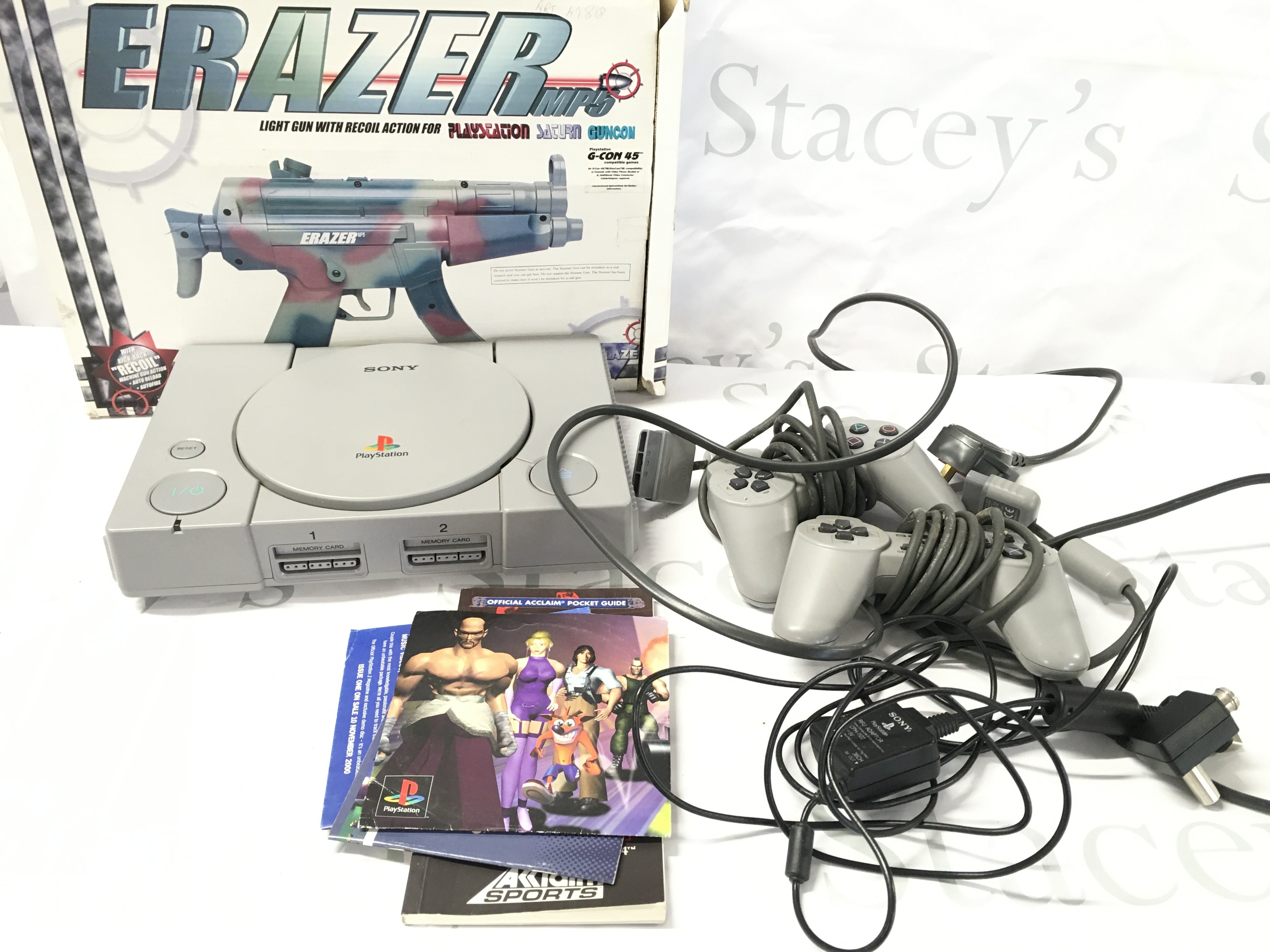 A Sony PlayStation with A Collection of Games. No Reserve.