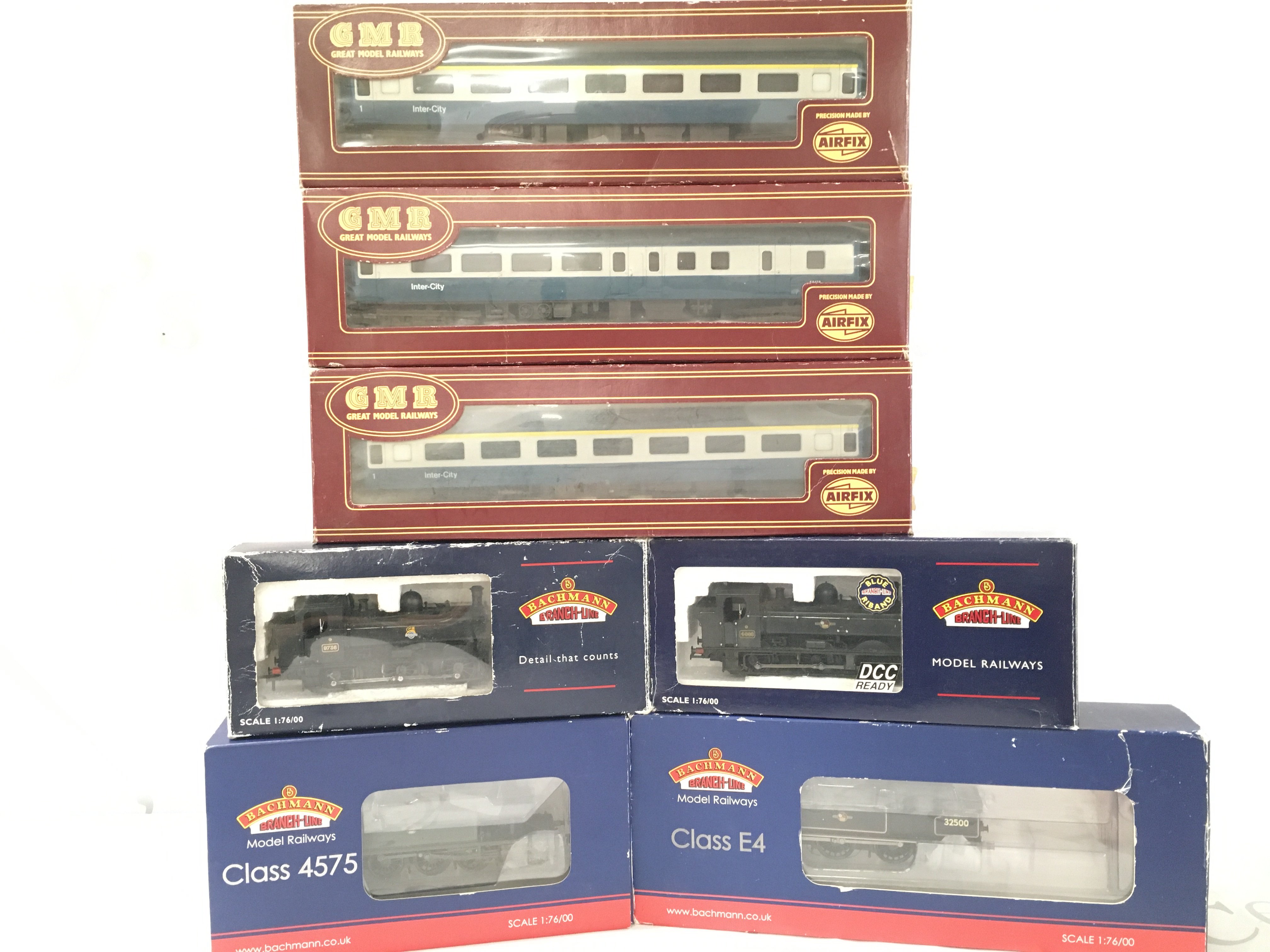 A Collection of 4 Boxed Bachmann 00 Gauge Locomotives and 3 GMR Coaches.