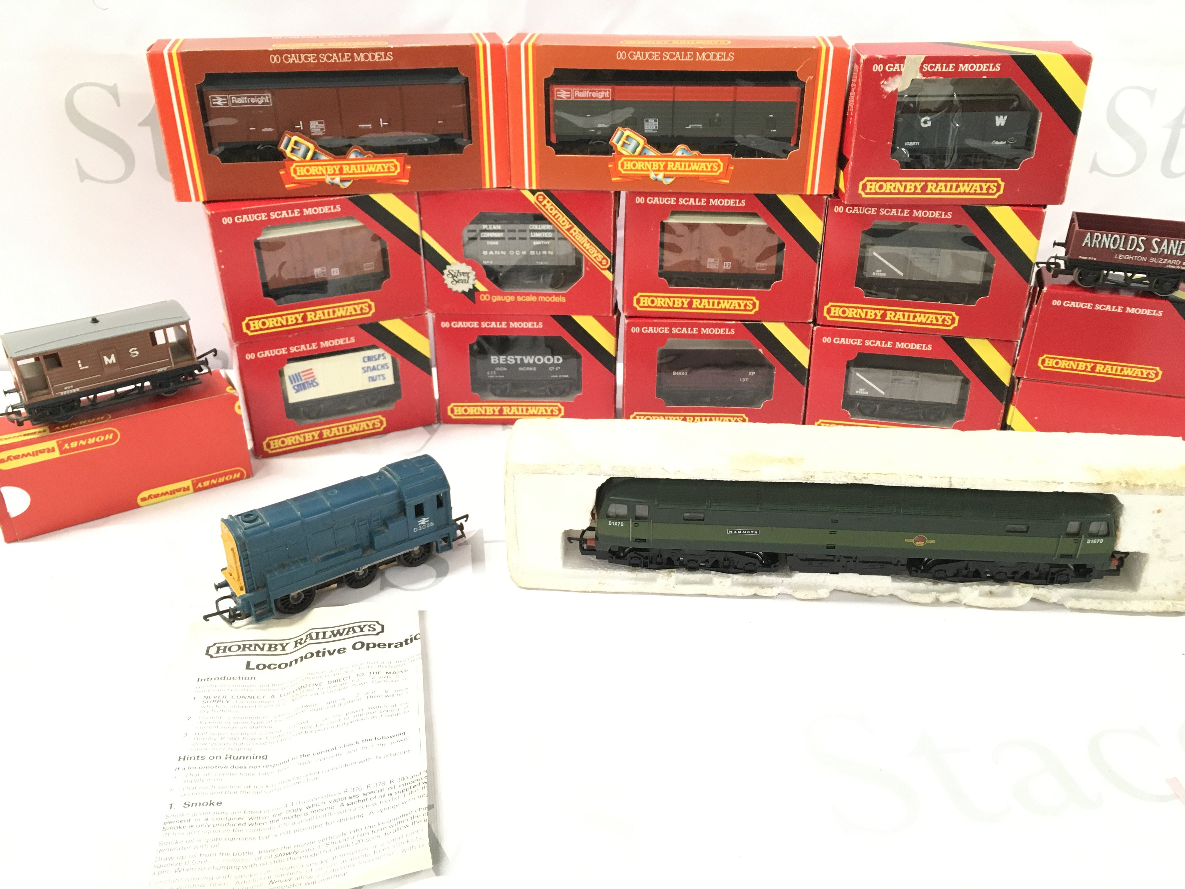 A Collection of Boxed And Loose 00 Gauge Wagons Including 2 Locos.