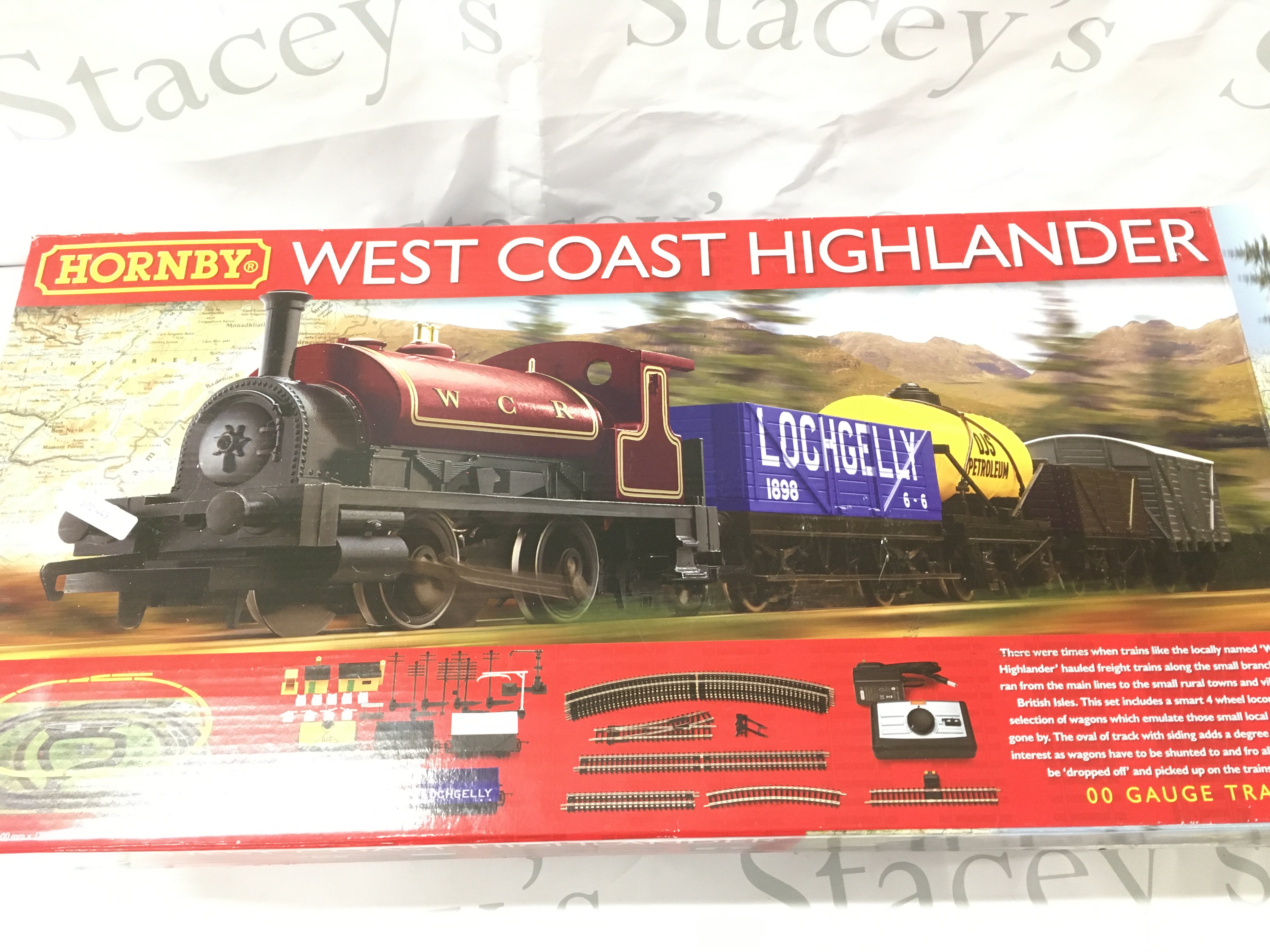 A Boxed Hornby 00 Gauge West Coast Highlander Set #R1157. Parts Missing.