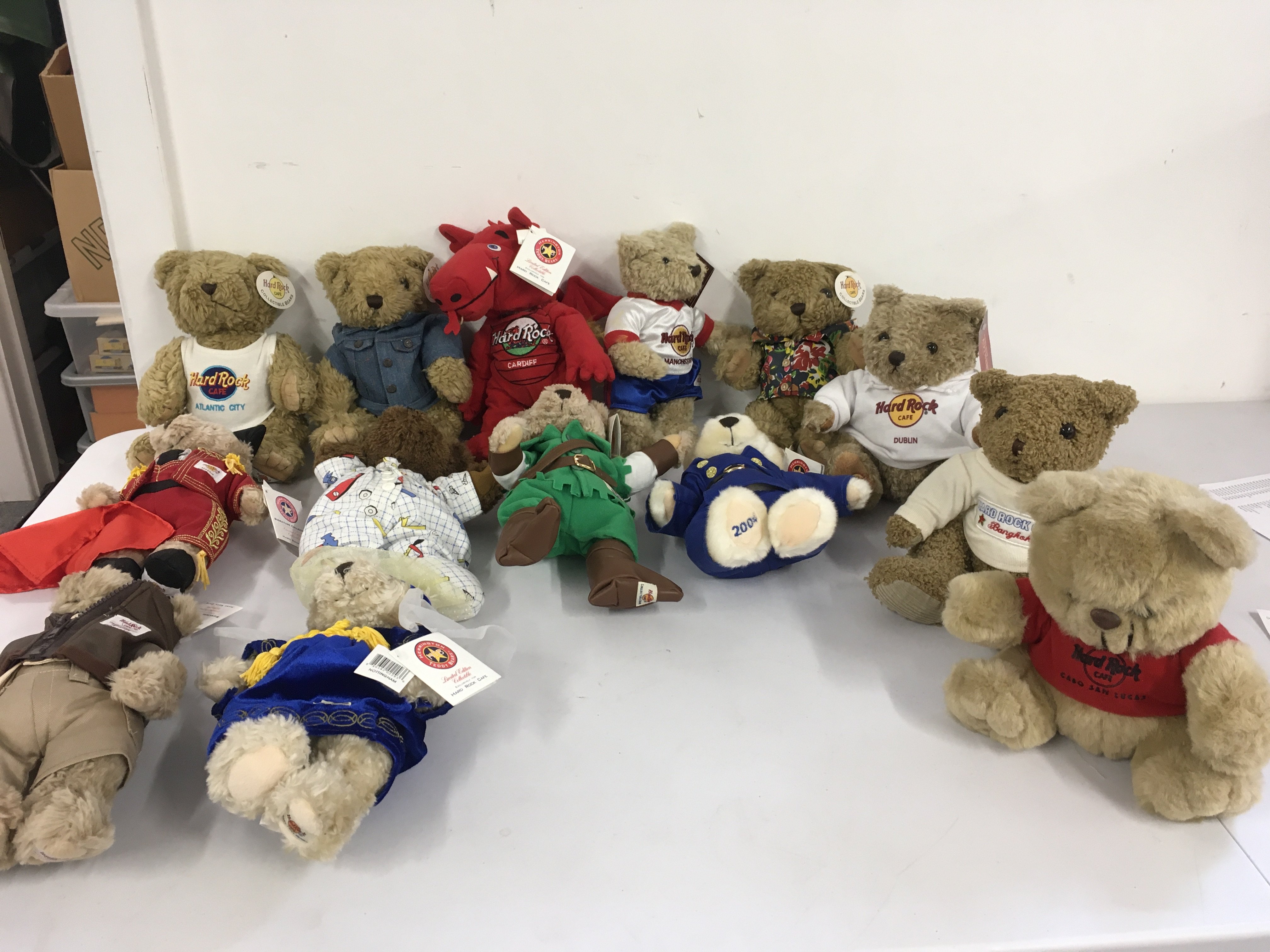 A collection of 14 Hard Rock Cafe Teddy Bears mostly with tags including some limited edition and Signature Collection pieces. No reserve