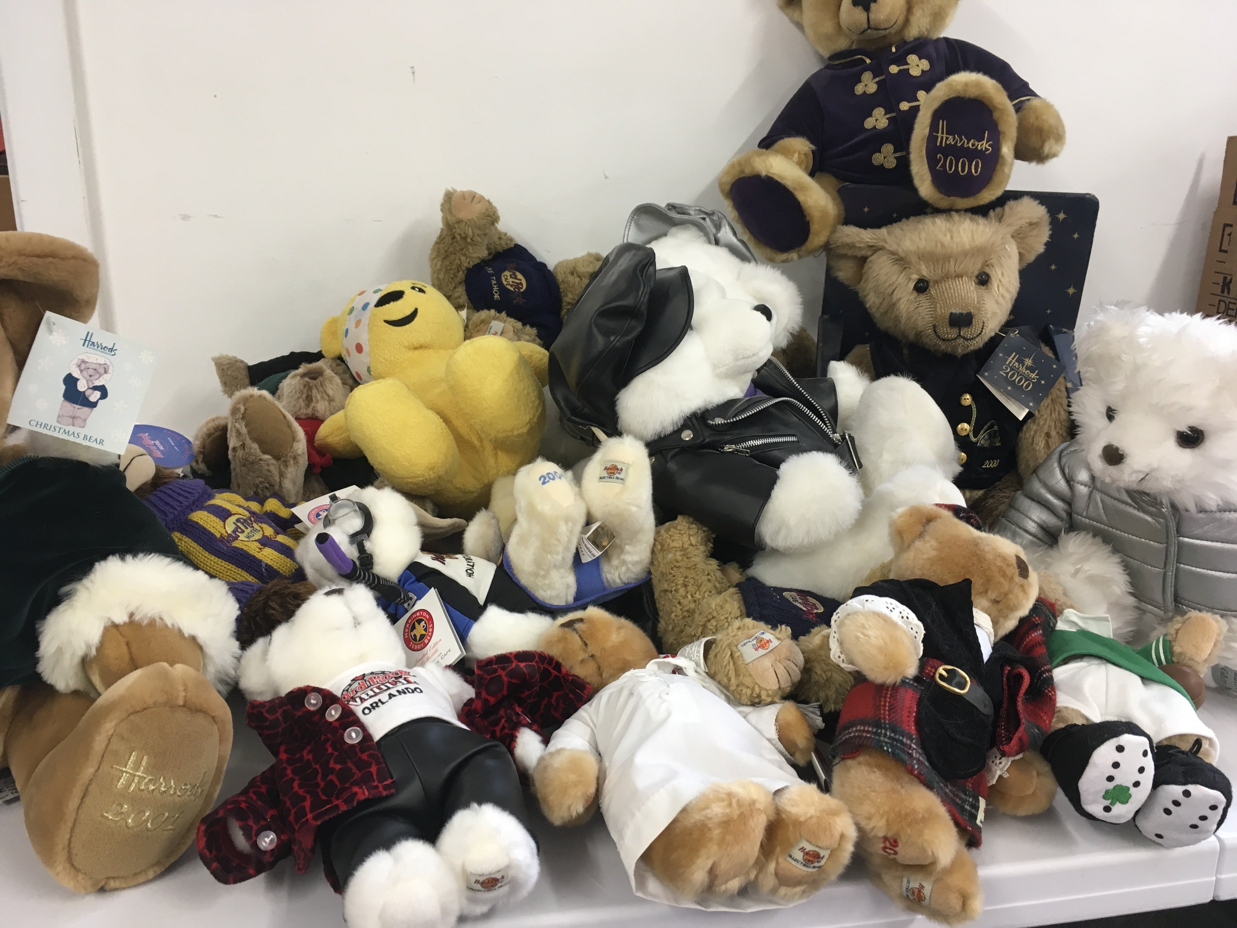A collection in excess of 20 Teddy Bears predominately Hard Rock Cafe but also includes others such as Harrods Christmas bears and Pudsy. No reserve.