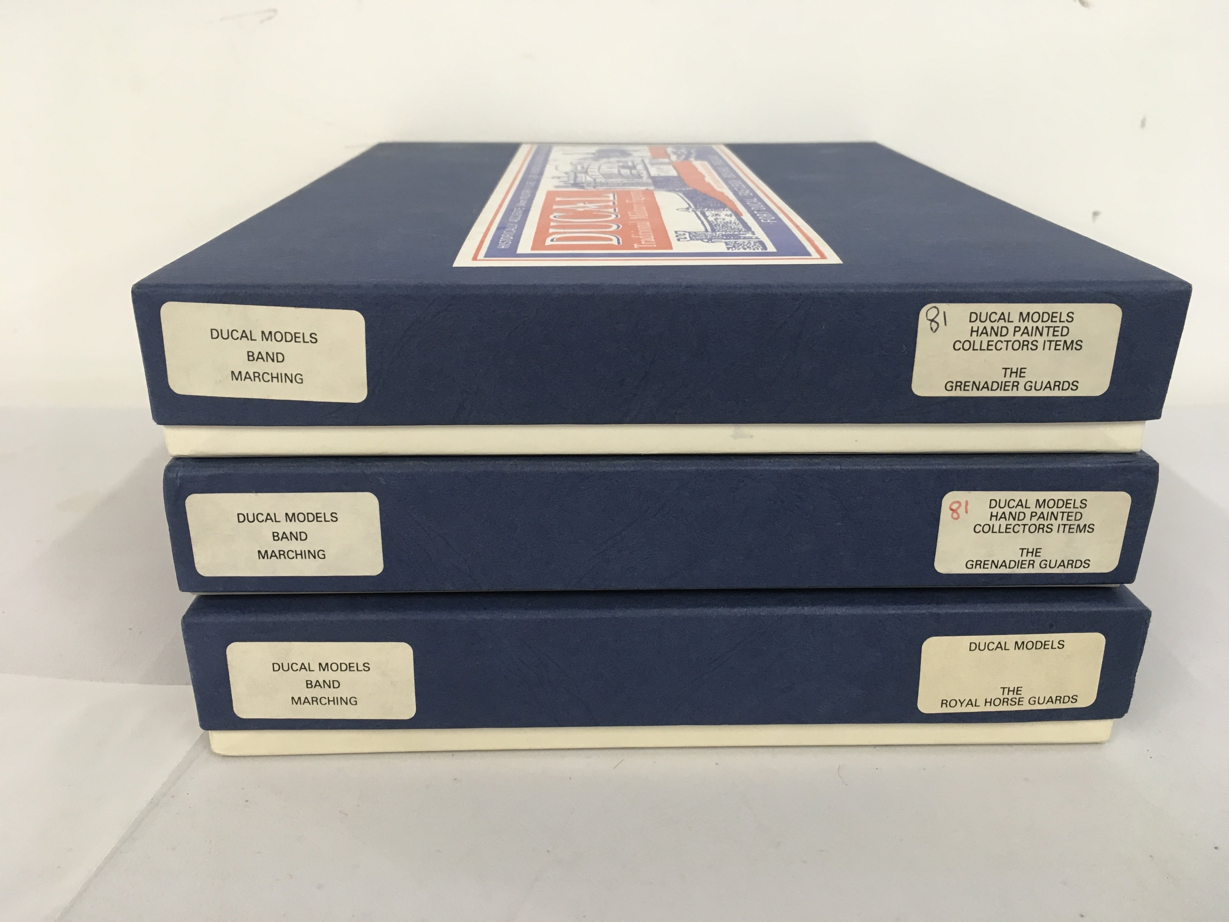 3 boxed Ducal sets of metal military figures featuring the marching band of The Grenadier Guards and The Royal Horse Guards. No reserve