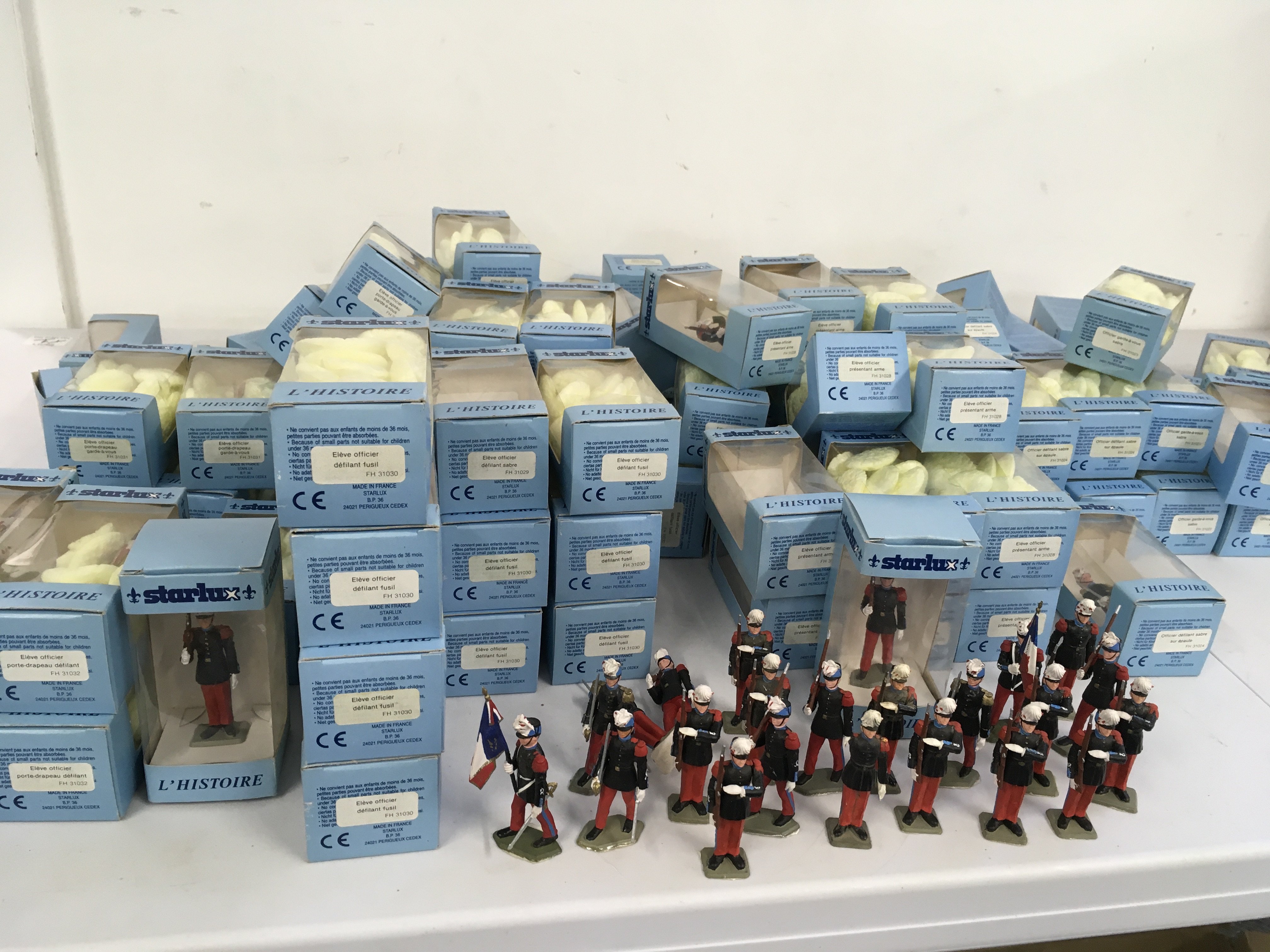 A collection of 95 boxed Starlux plastic model soldiers and 22 loose ones. No reserve