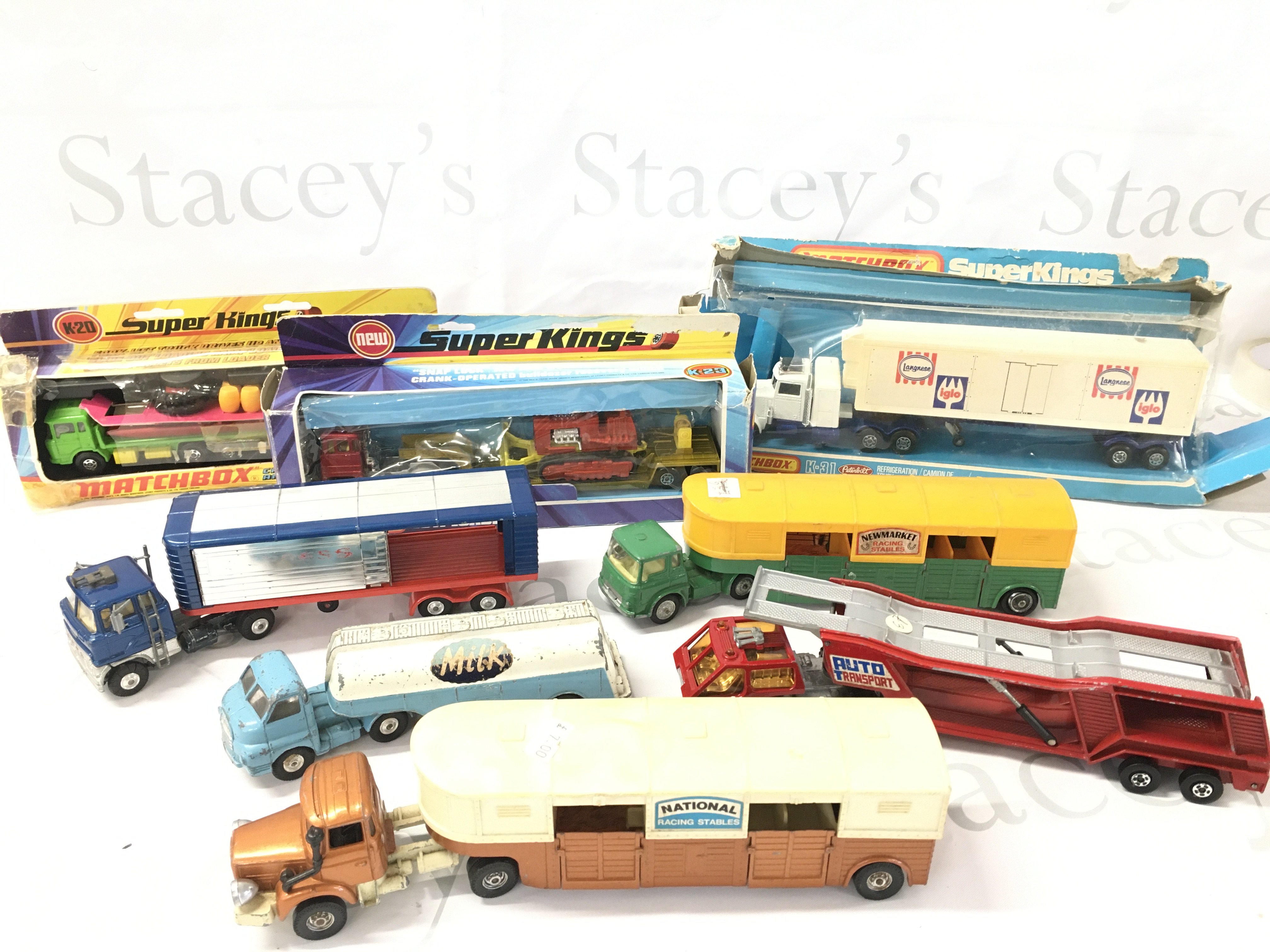 A Collection of Boxed And Loose Diecast Trucks By Matchbox And Corgi. Boxes Are in A Poor State. No Reserve.