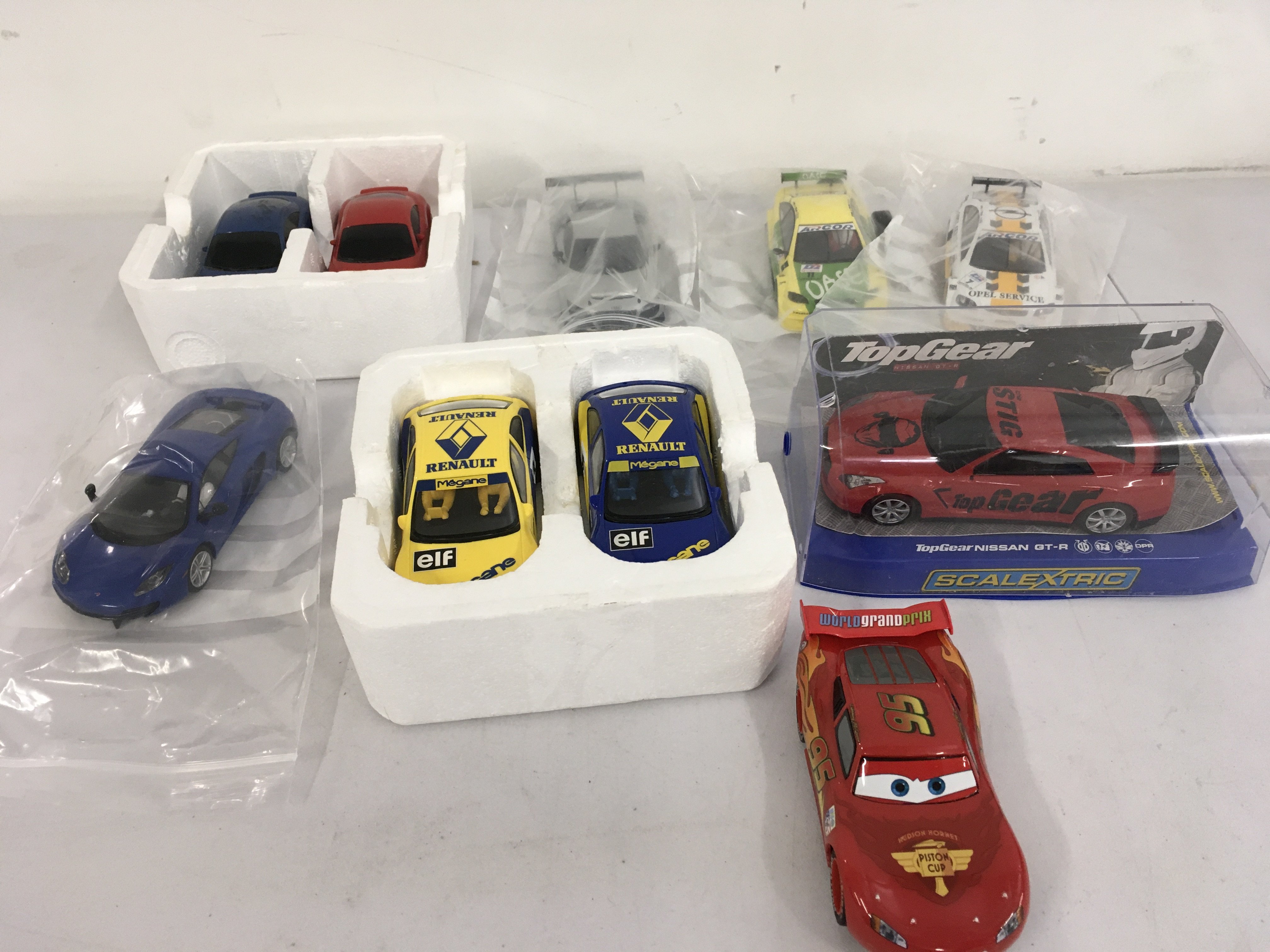 A collection of 10 slot cars by Scalextric and Hornby. No reserve