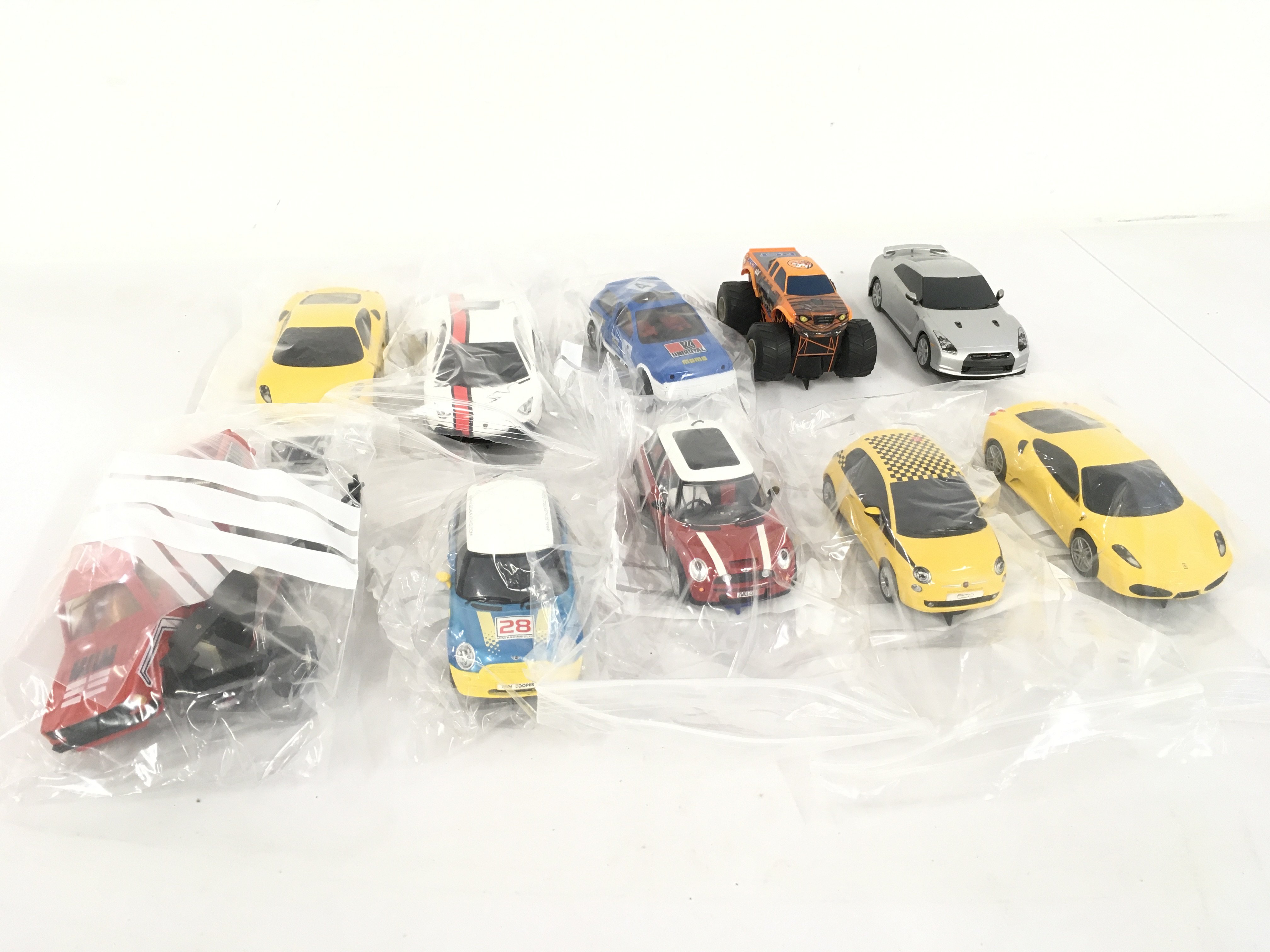 A collection of 10 Scalextric and Hornby slot cars. Mostly ready to race one for spares or repair. No reserve