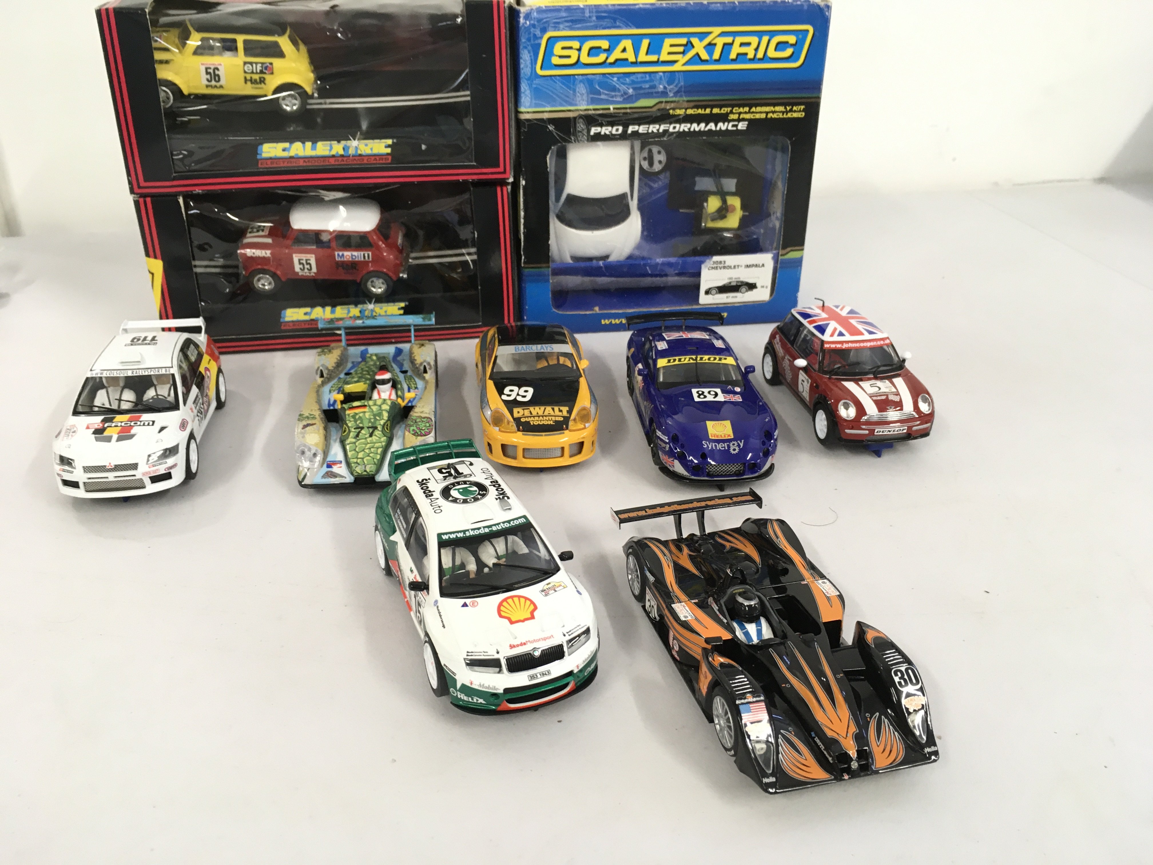 A collection of boxed and loose Scalextric..Hornby slot cars. No reserve