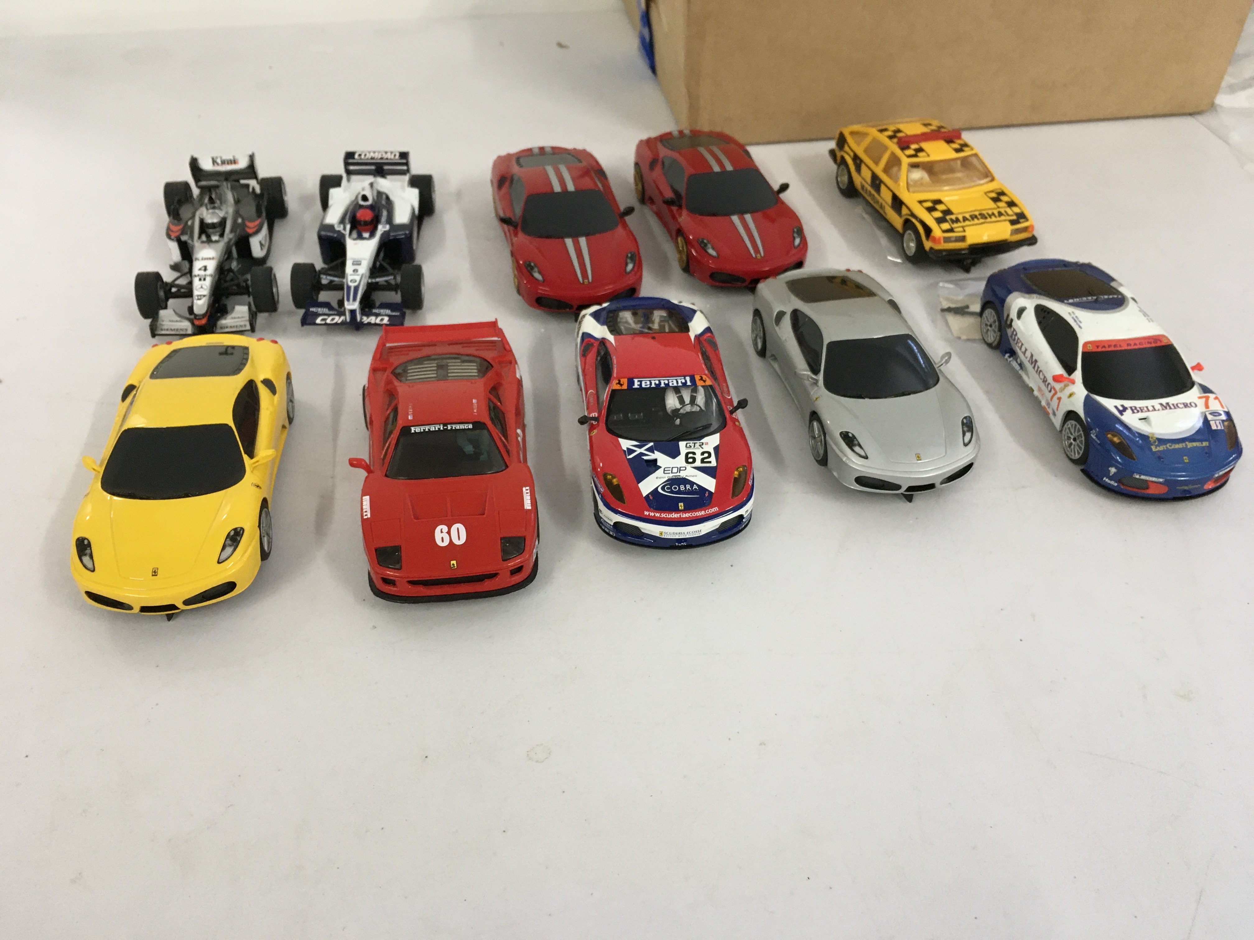 A collection of 10 Scalextric..Hornby slot racing cars. Some ready to race some for spares or repair. No reserve.