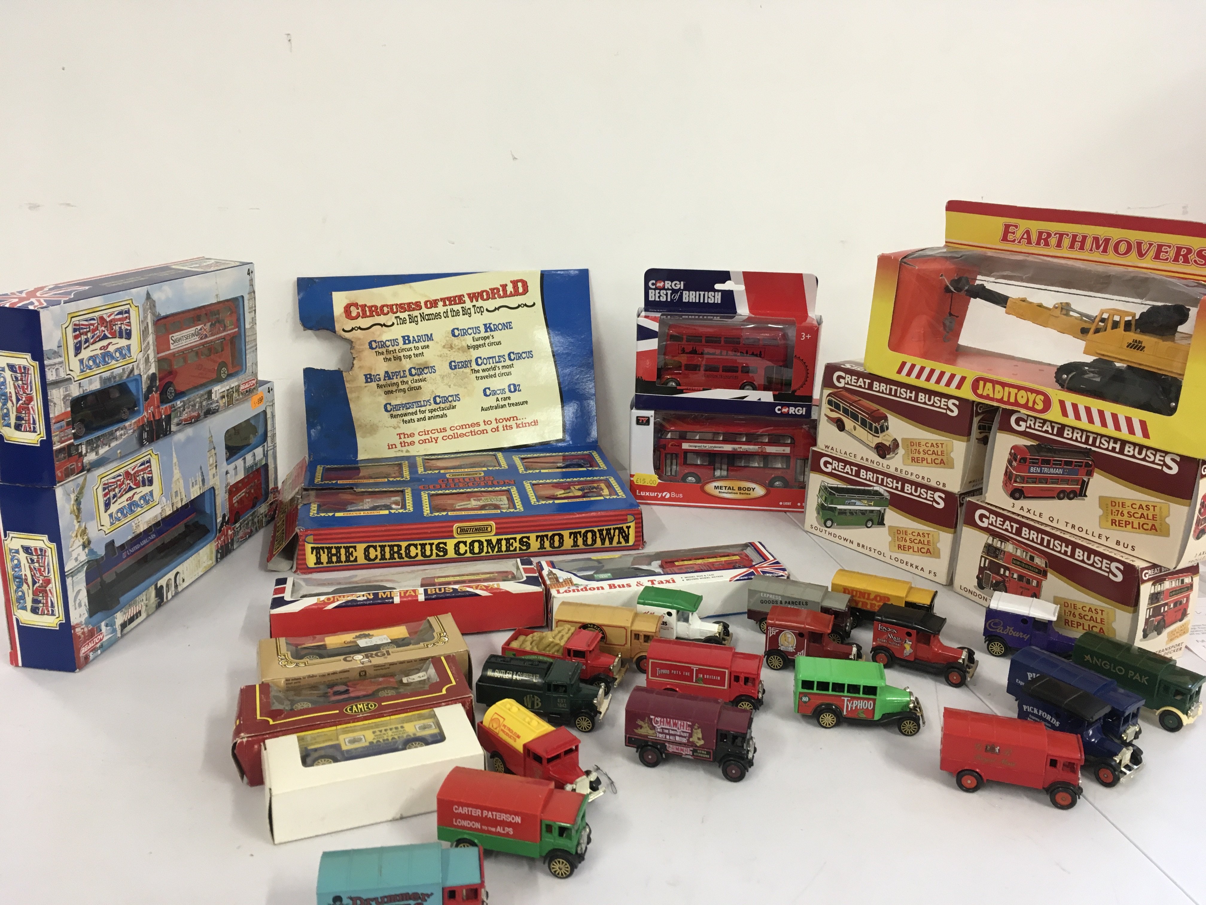 A collection of 15 boxed and 18 loose diecast and plastic model vehicles mostly buses by Matchbox..Corgi..Atlas etc. no reserve