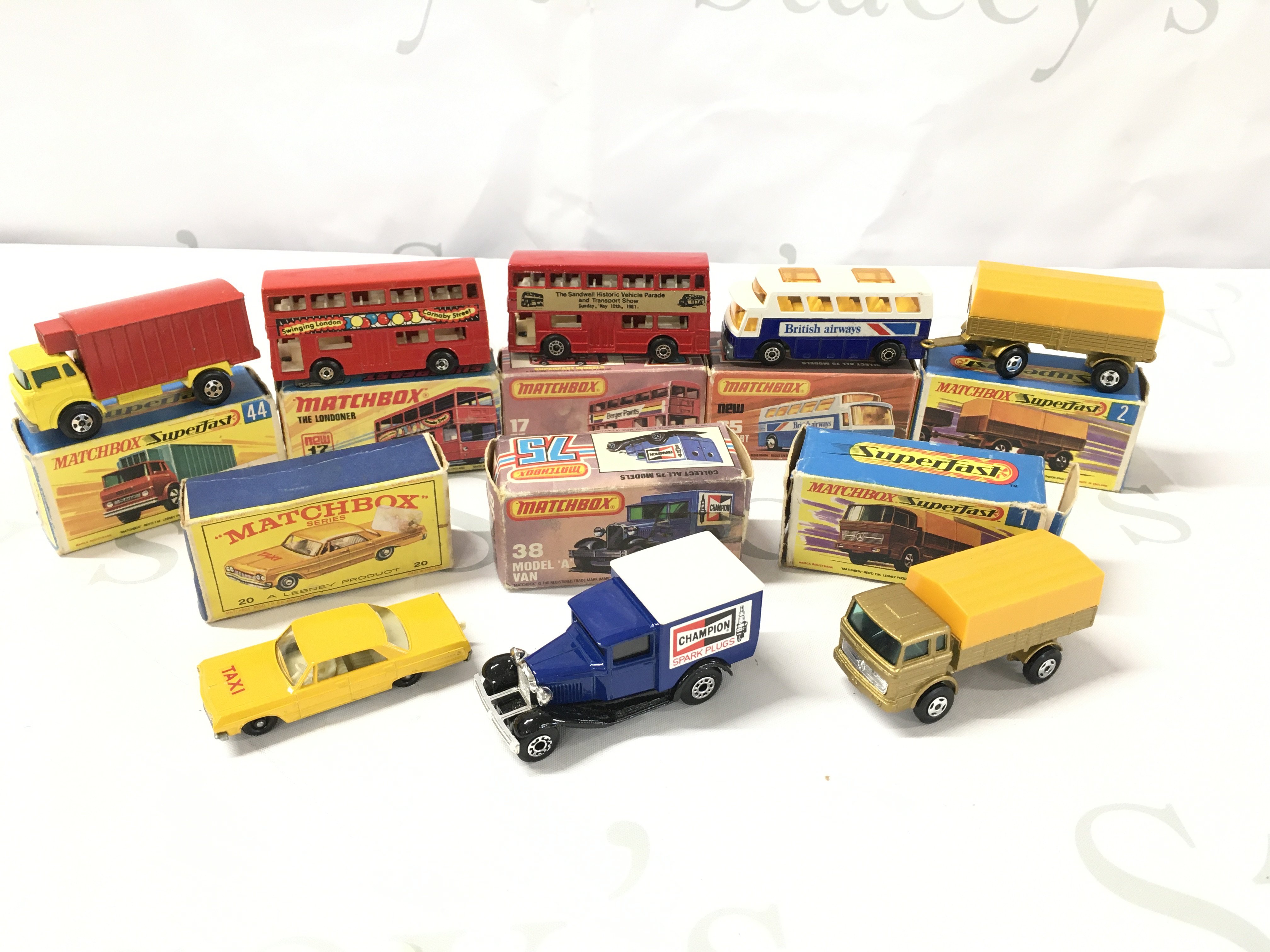 A Collection Of 8 Boxed Matchbox Vehicles. Including Superfast. Boxes In Various States. No Reserve.