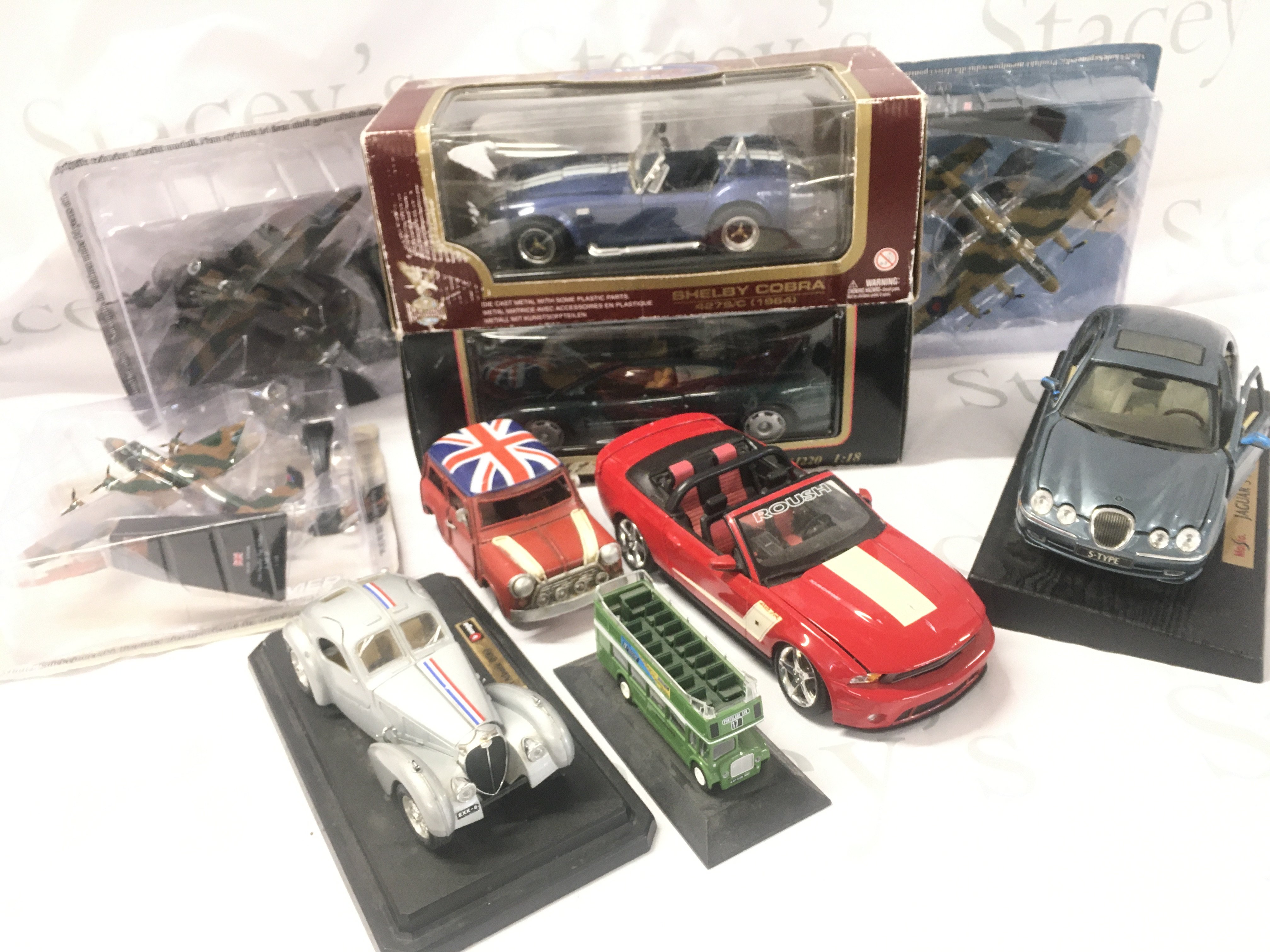 A Collection of Boxed And Loose Diecast. Including Aircraft And Cars. No Reserve.